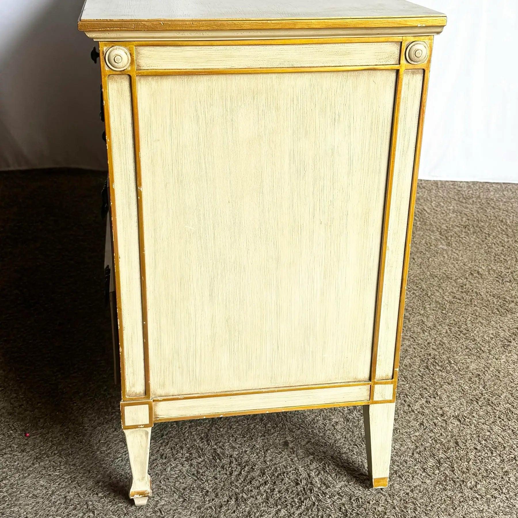 Mid-Century Widdicomb Gold Dresser—off-white lacquered finish with gilded trim and brass pulls exemplifies timeless elegance.
 
 Some wear to the surfaces and edges as shown in the photos. 
 
 We sell items as acquired, without restoring or
