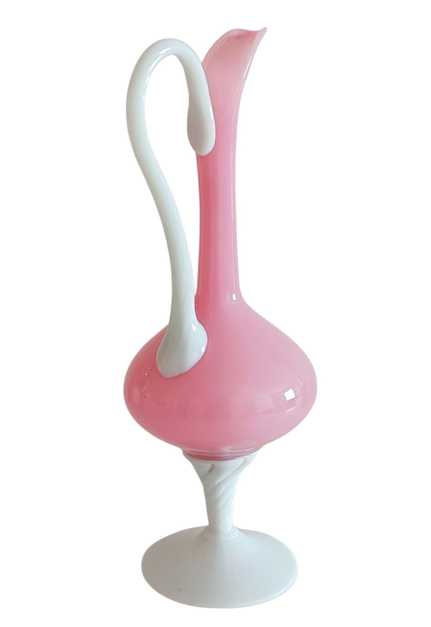 A stunning Opaline Florence pink and withe opal glass pitcher. Handmade in Empoli, Italy, circa the 1950s. 

In pristine condition. Stunning in the hand. 

Dimensions:

Height: 37cm (14.56in)
Diameter: 15cm (5.90in)
Base width: 11cm (4.33in)

We