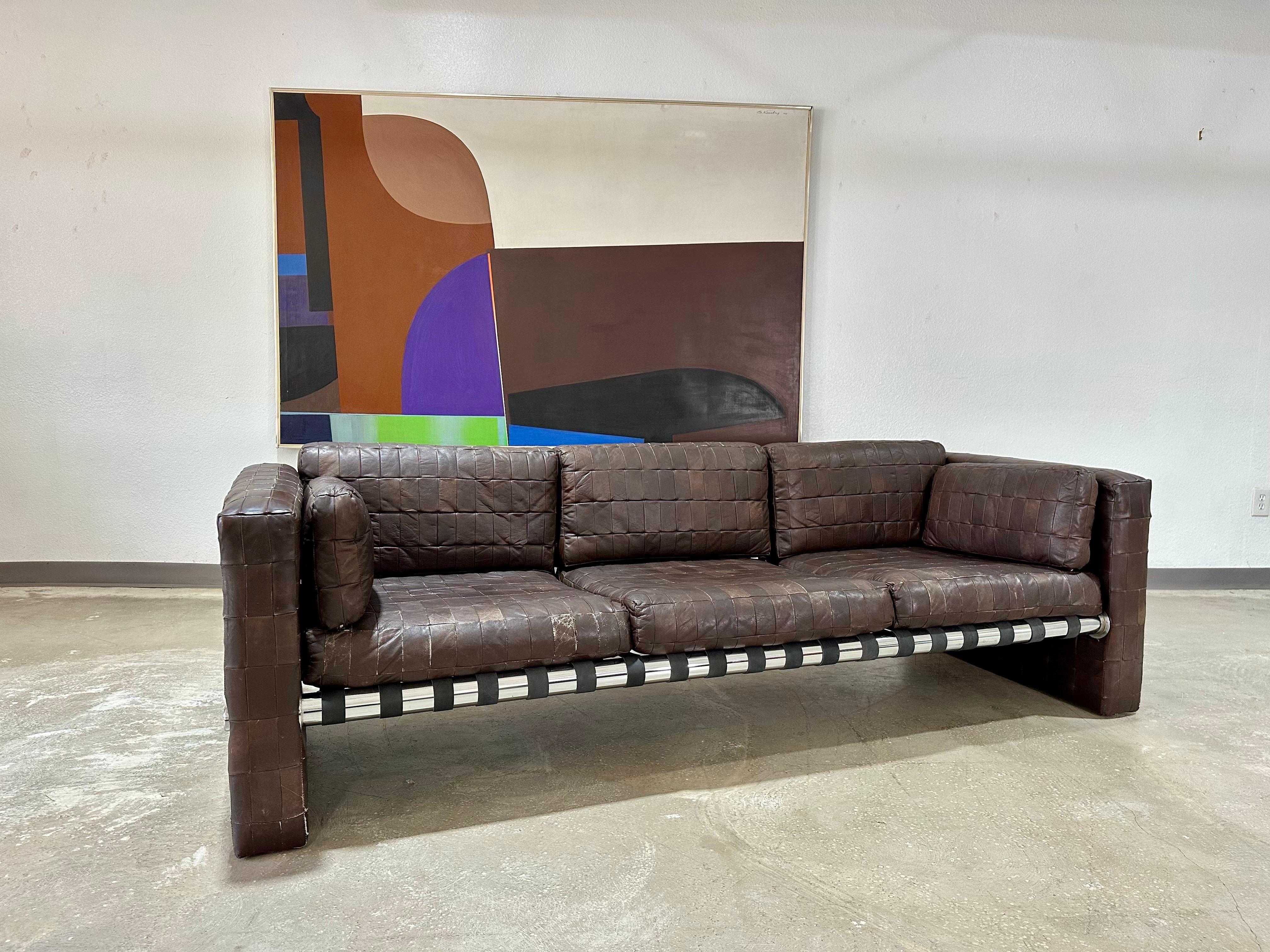Swiss Vintage Mid Century Patchwork Leather and Chrome Sofa in the style of De Sede For Sale