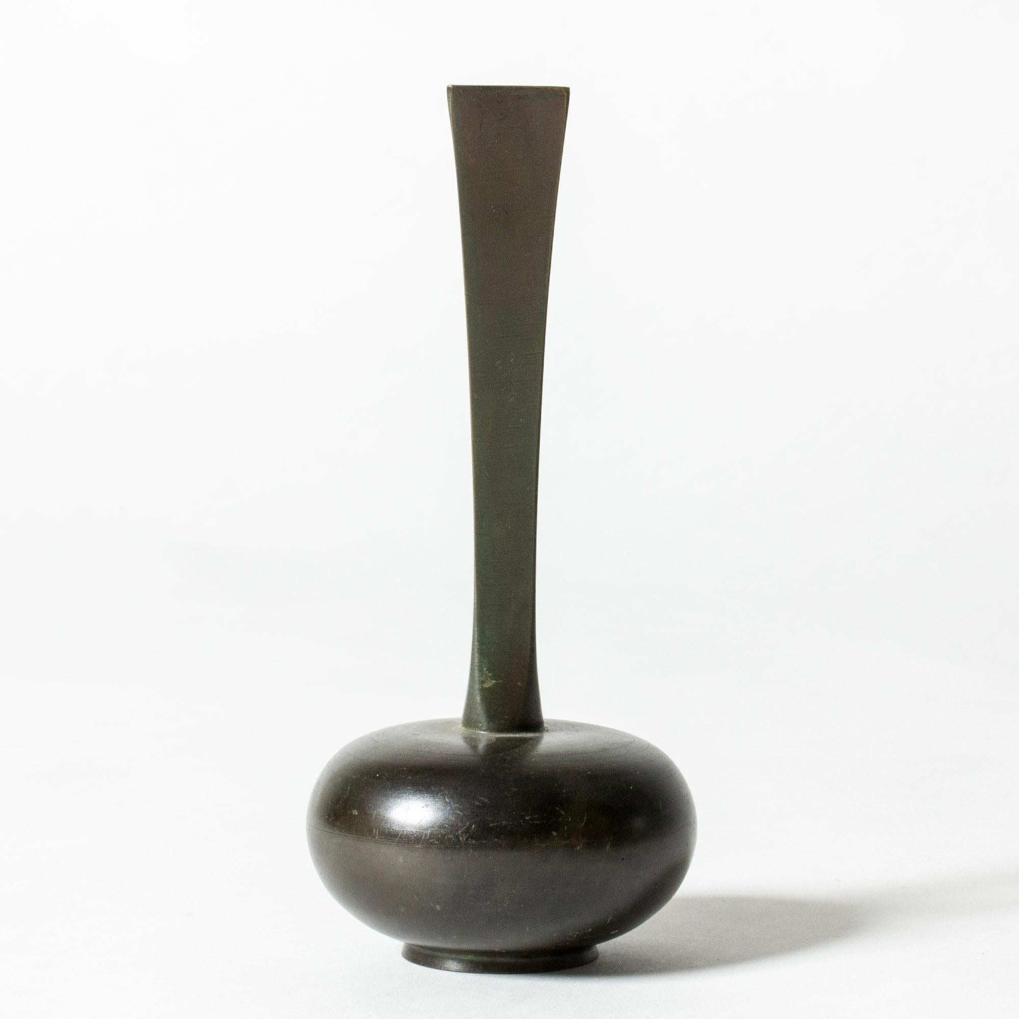 Beautiful bronze vase from GAB, patinated dark green in varying nuances. Plump base contrasted with a slender, tapering neck.

GAB was founded in Stockholm in 1867 and was an important influence on the Swedish art and crafts and industrial design