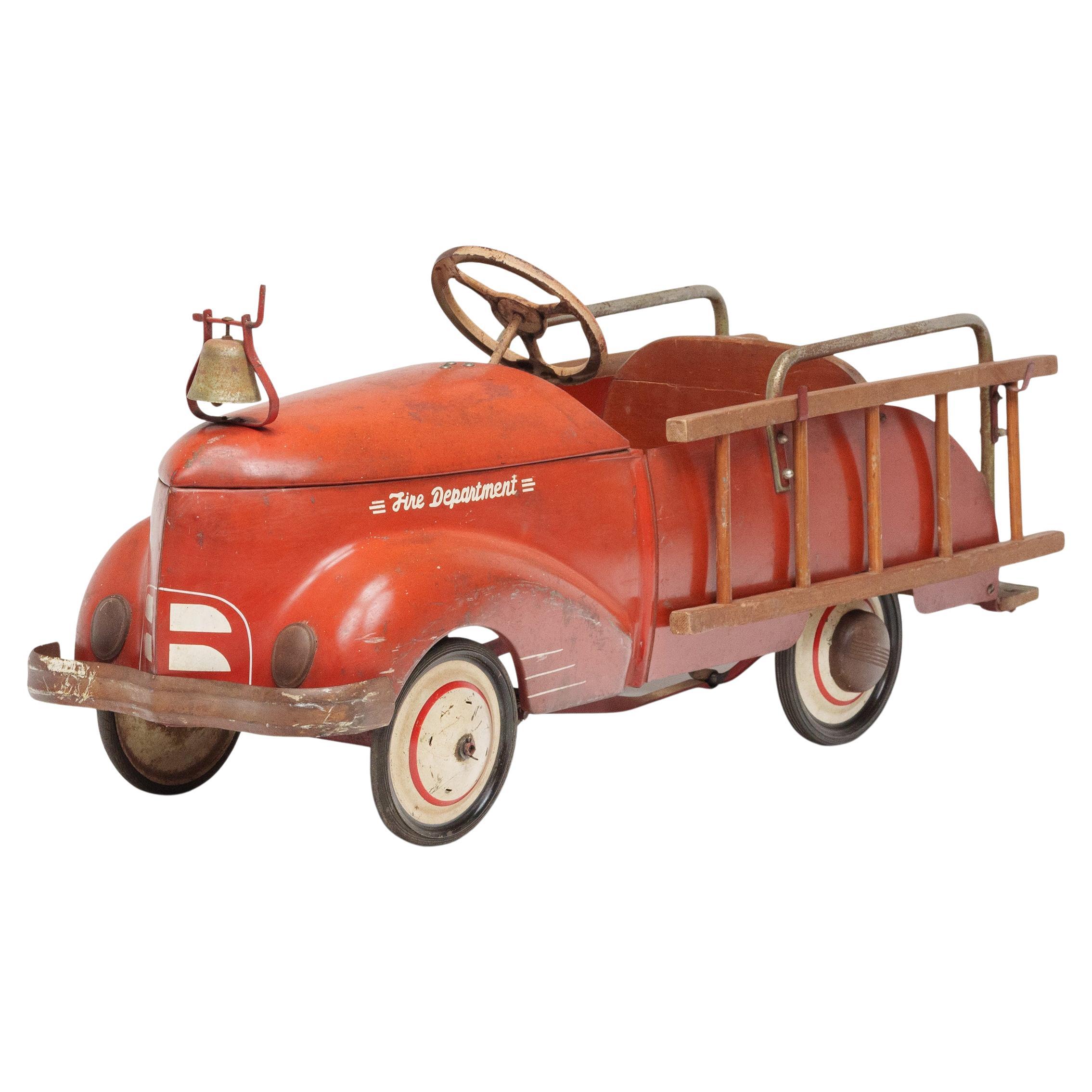 Vintage Mid-Century Pedal Car Fire Truck