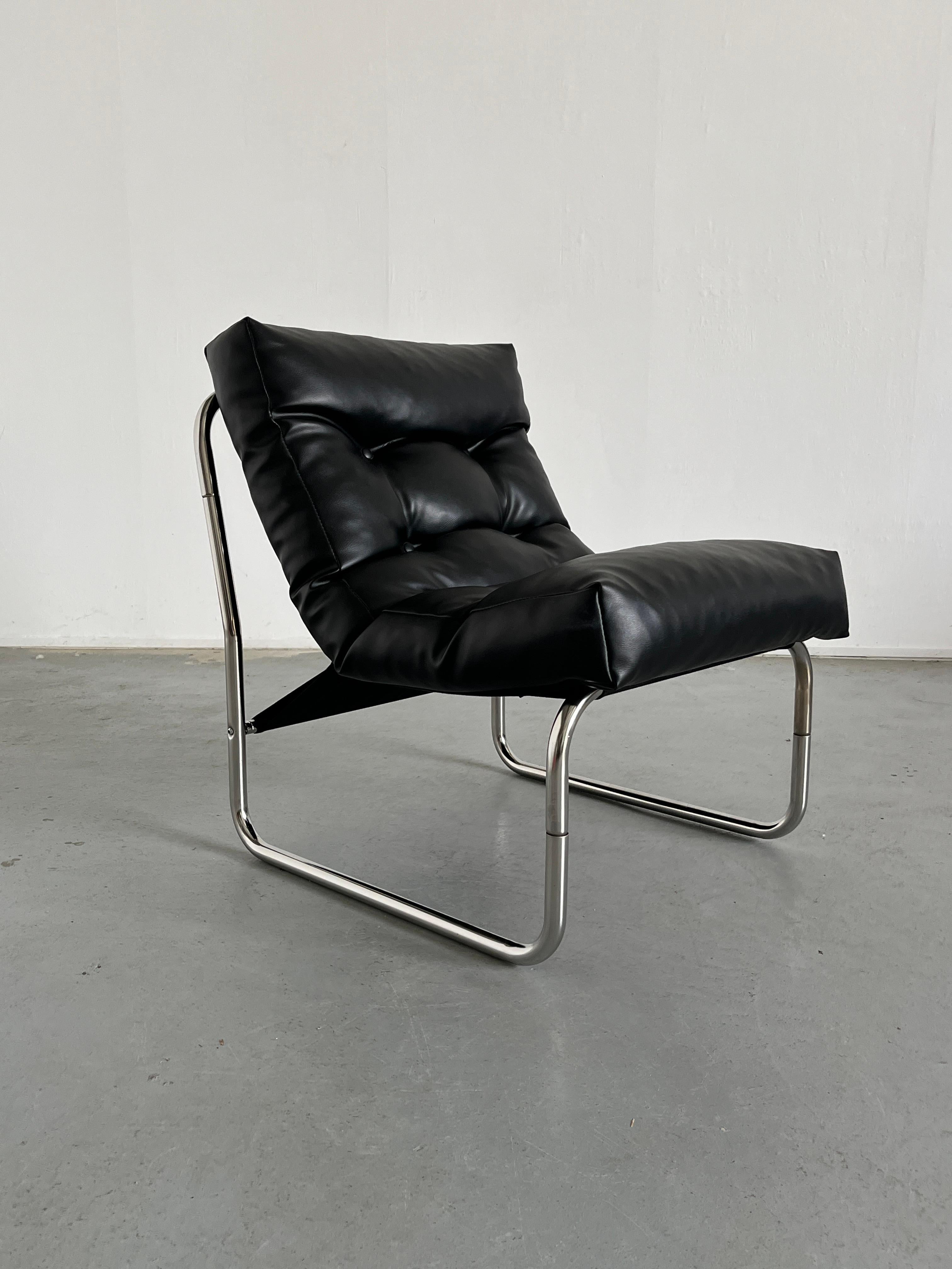 Iconic vintage “Pixi” chair designed by famed designer Gillis Lundgren for IKEA in 1976. In excellent black leather with a chromed tubular steel frame. Classic vintage Ikea.

The lounge chair is in good vintage condition with smaller expected signs