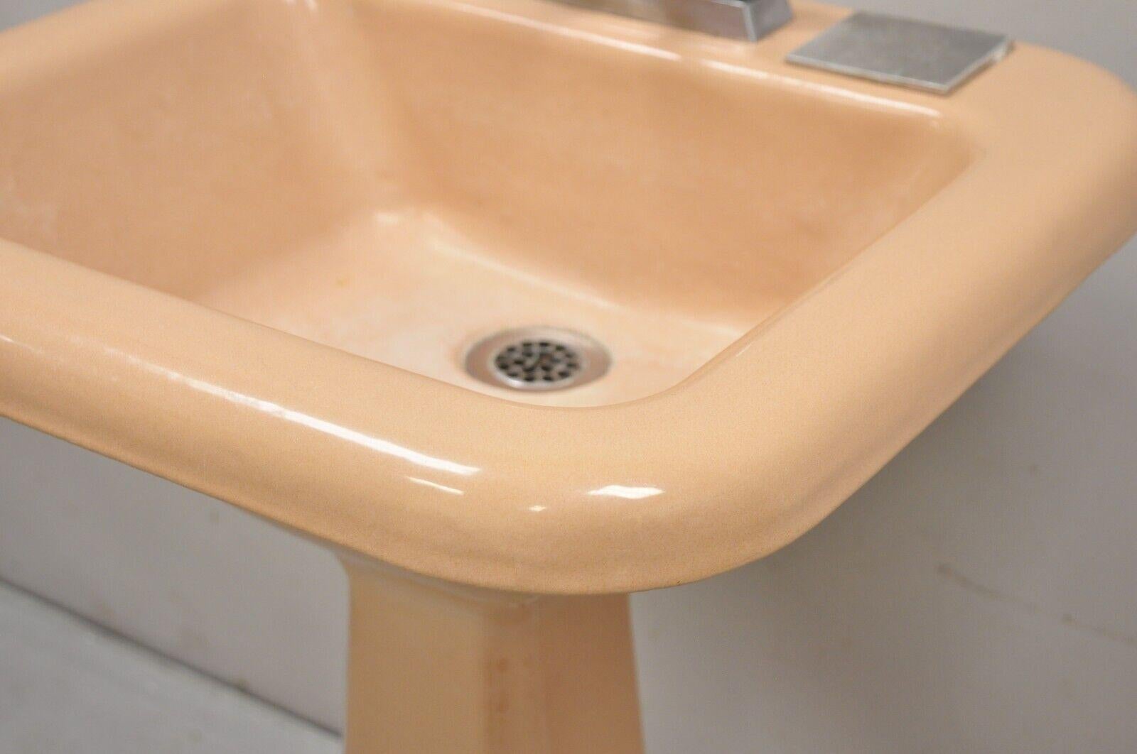 scalloped pedestal sink