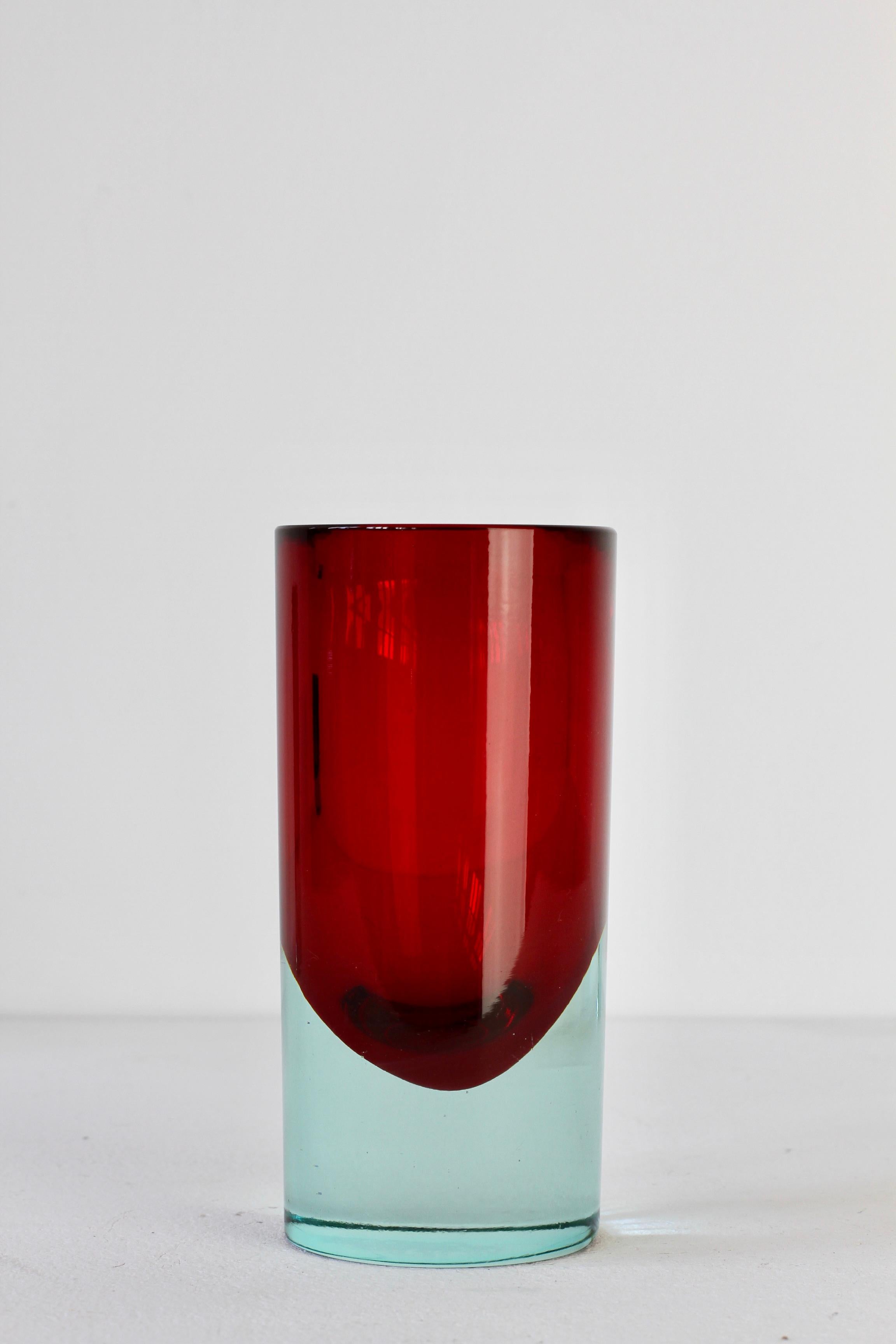 Vintage midcentury Italian Murano glass vase, circa 1965-1975. Made using the Sommerso (submerged) glass technique with a light blue / clear layer over red colored glass.

The maker is, as yet, unidentified but the style is similar to Murano Glass