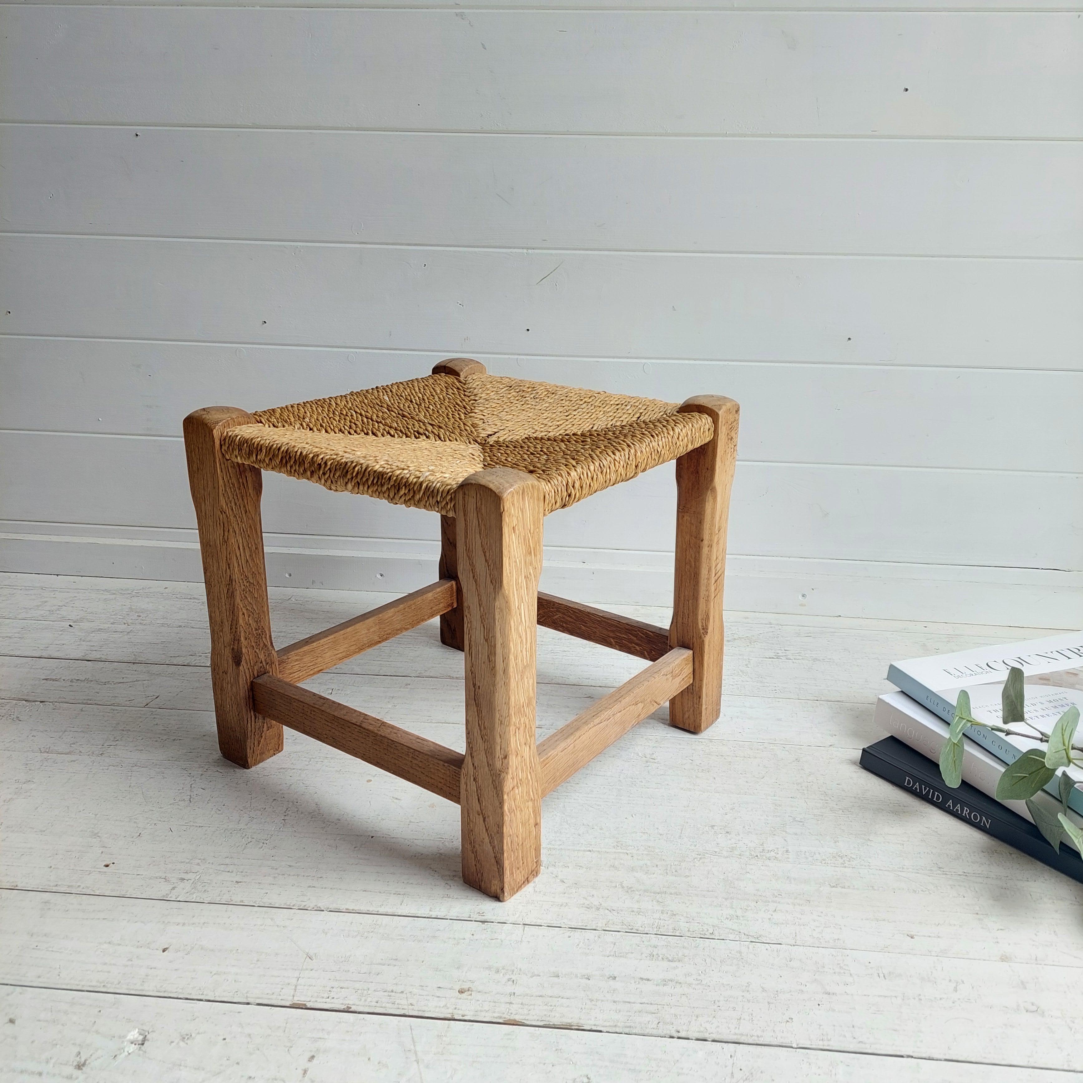 There are lots of little vintage stools about, but not many like this rustic example. 

Woven Stool, British, Mid Century
One of the original in this design. 
Rustic look
Oak wooden frame with lovely woven seat
Light oak finish
Wonderful triangular