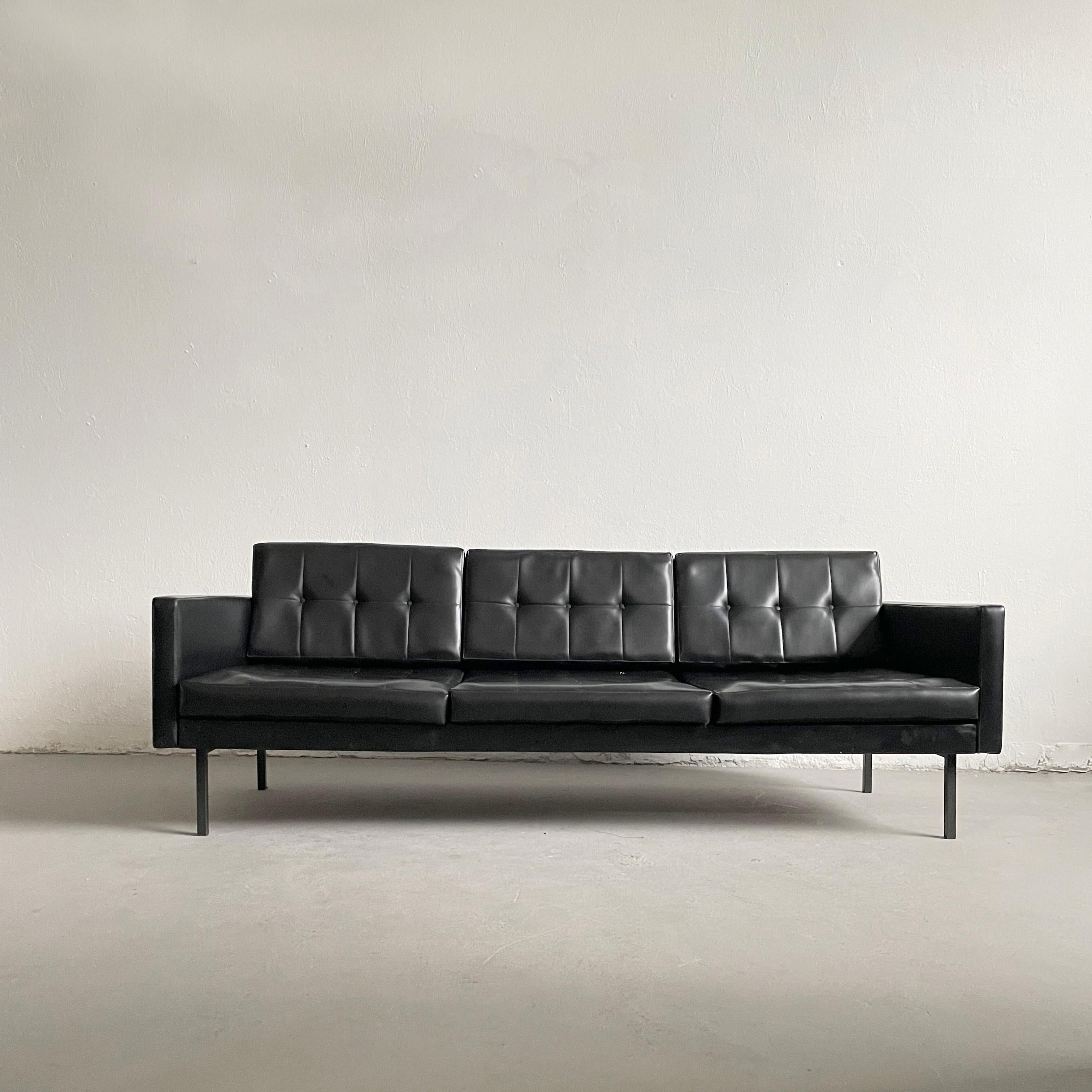 Vintage Danish modern style 3-seater sofa manufactured by Stol, Slovenia 1960s

Wooden frame is upholstered in original glossy black vinyl and it's supported by 4 metal legs. The sofa has 6 removable cushions and adjustable backrest. 

The sofa is