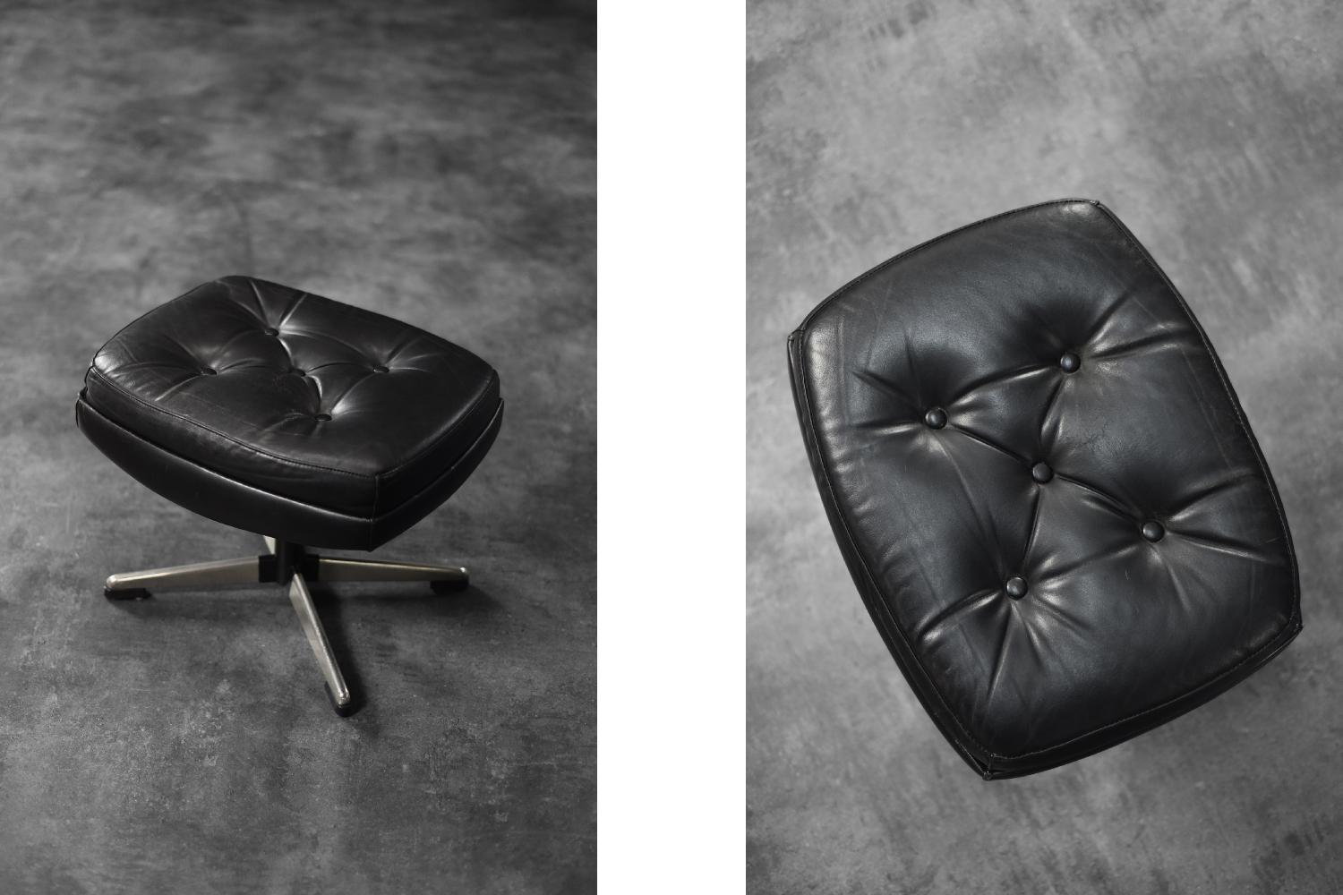 This modernist ottoman was manufactured in Scandinavia during the 1970s. It is upholstered in black, natural leather, with a visible patina and light signs of wear, it attests to its authentic origins and due it a extraoridinary character. The