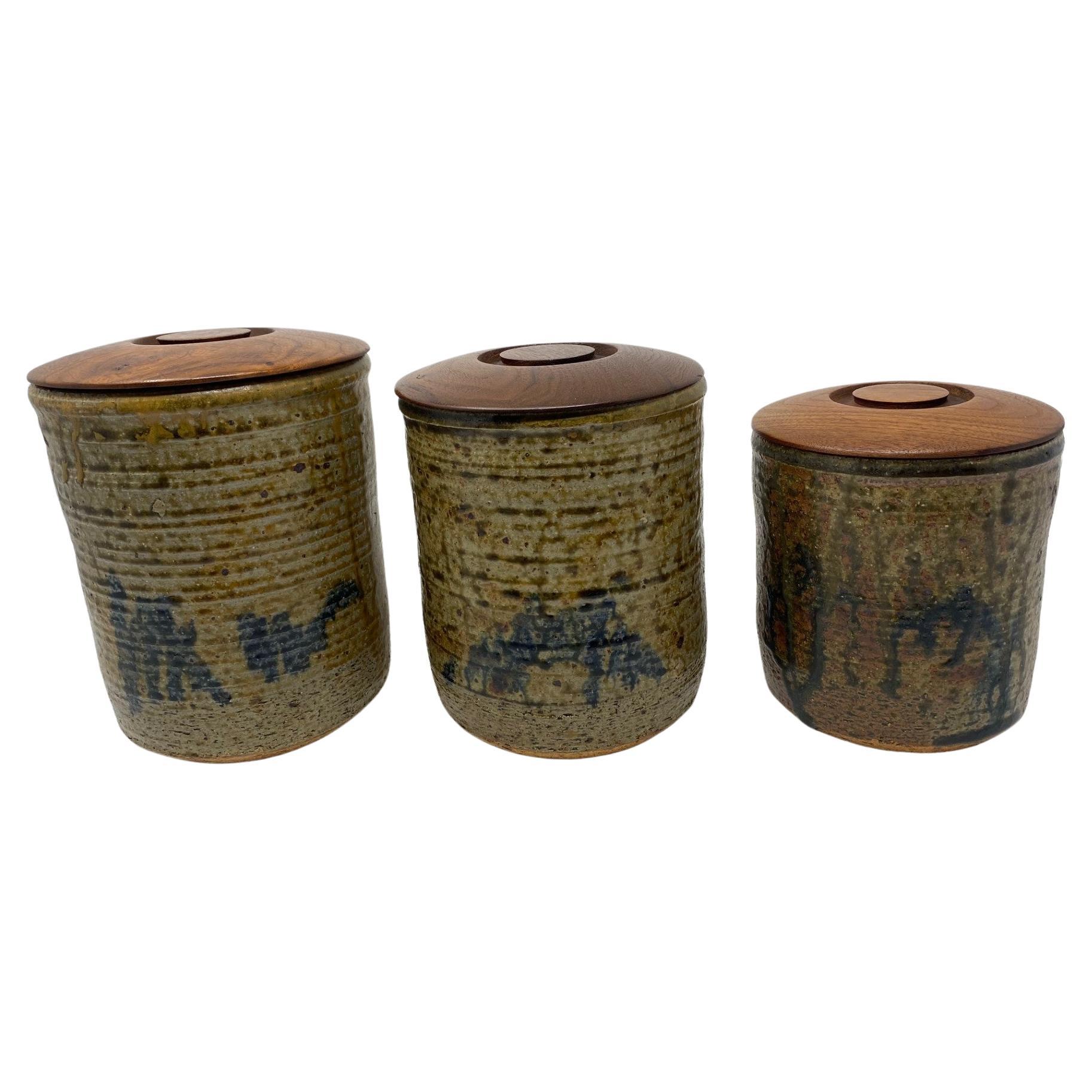 Vintage Mid-Century Set of 3 Ceramic Canisters with Wooden Lids Studio Pottery For Sale