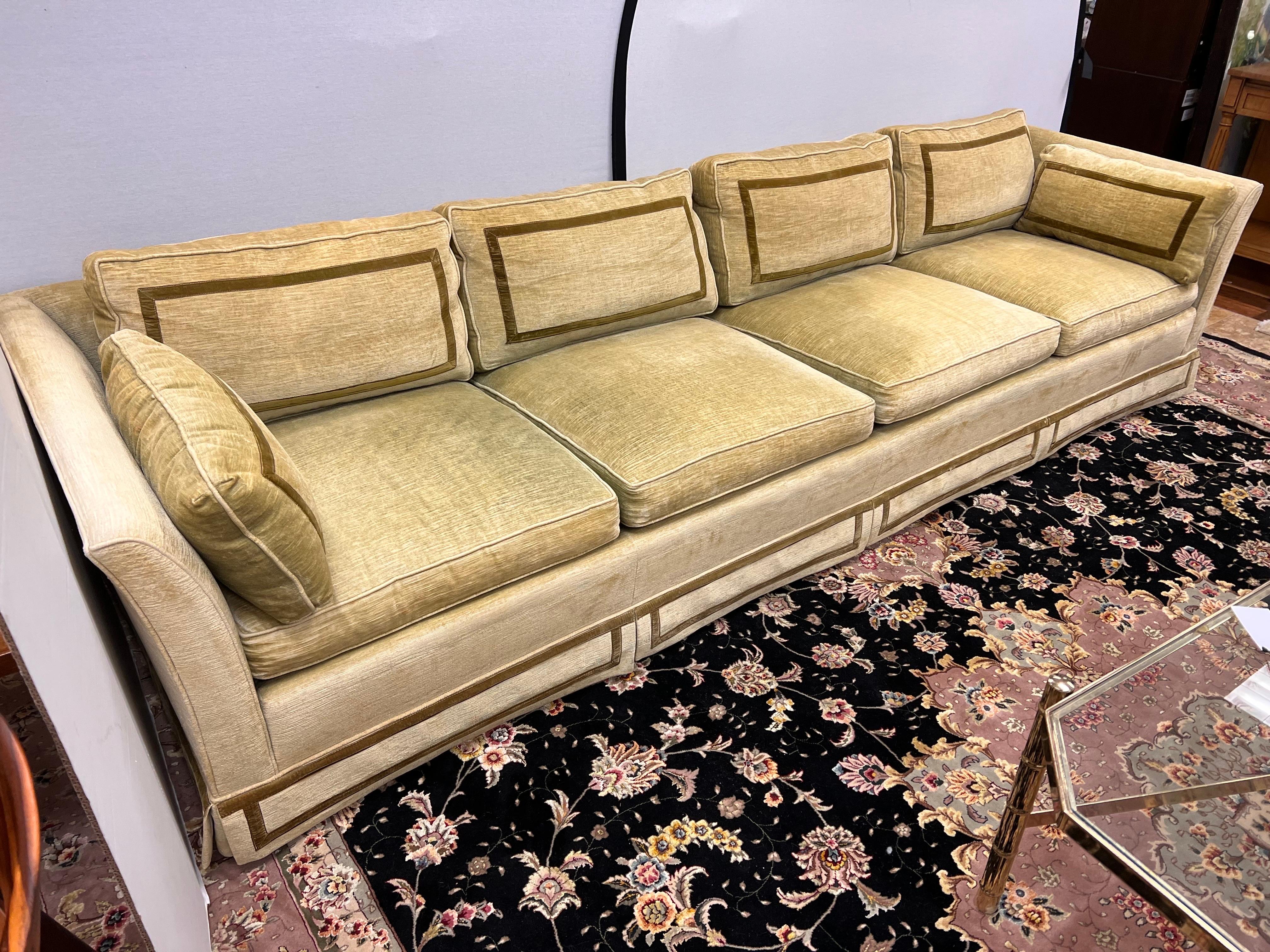 Stunning rare 9 ft signed vintage Erwin Lambeth sofa with original fabric. Although slightly faded from its age, this Erwin Lambeth sofa still retains its beauty after 50 plus years. The original fabric is a pretty light olive green velvet with