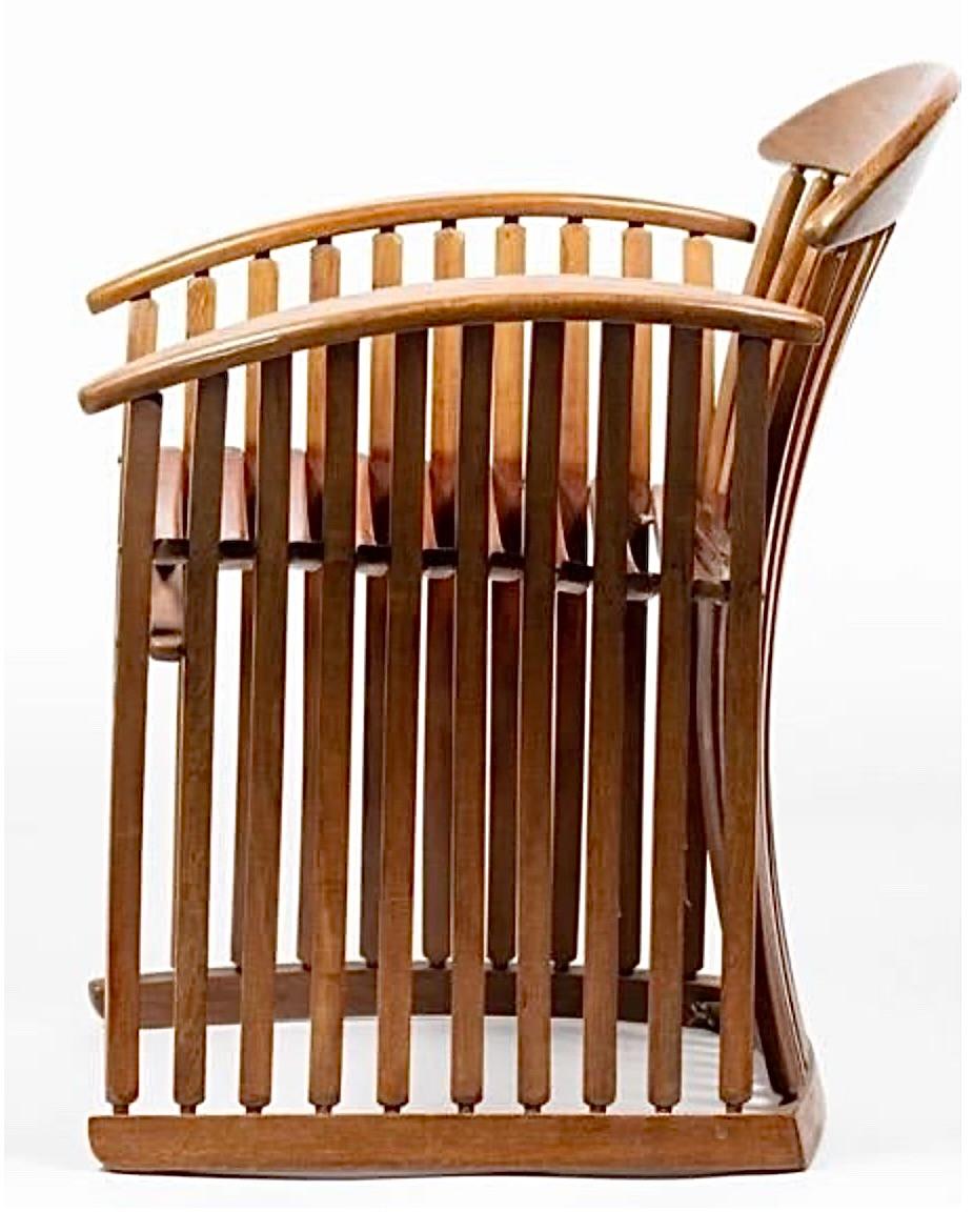 Il s'agit d'une superbe paire de fauteuils de style steamer du 20e siècle. Ils sont fabriqués en acajou et en teck avec une construction en bois courbé. Ils sont incroyablement confortables, avec ou sans coussins. 