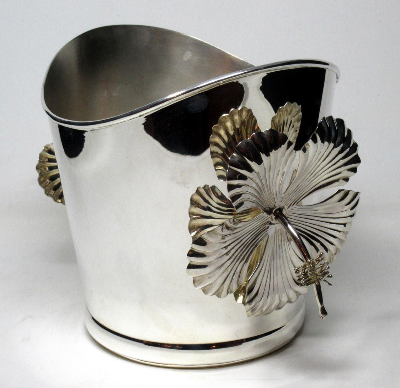 Impressive heavy gauge sterling silver Champagne or wine cooler of outstanding quality and generous size, mid-20th century, of continental origin. Complete with its original silk covered casket.

Of traditional form, with twin handles modeled as