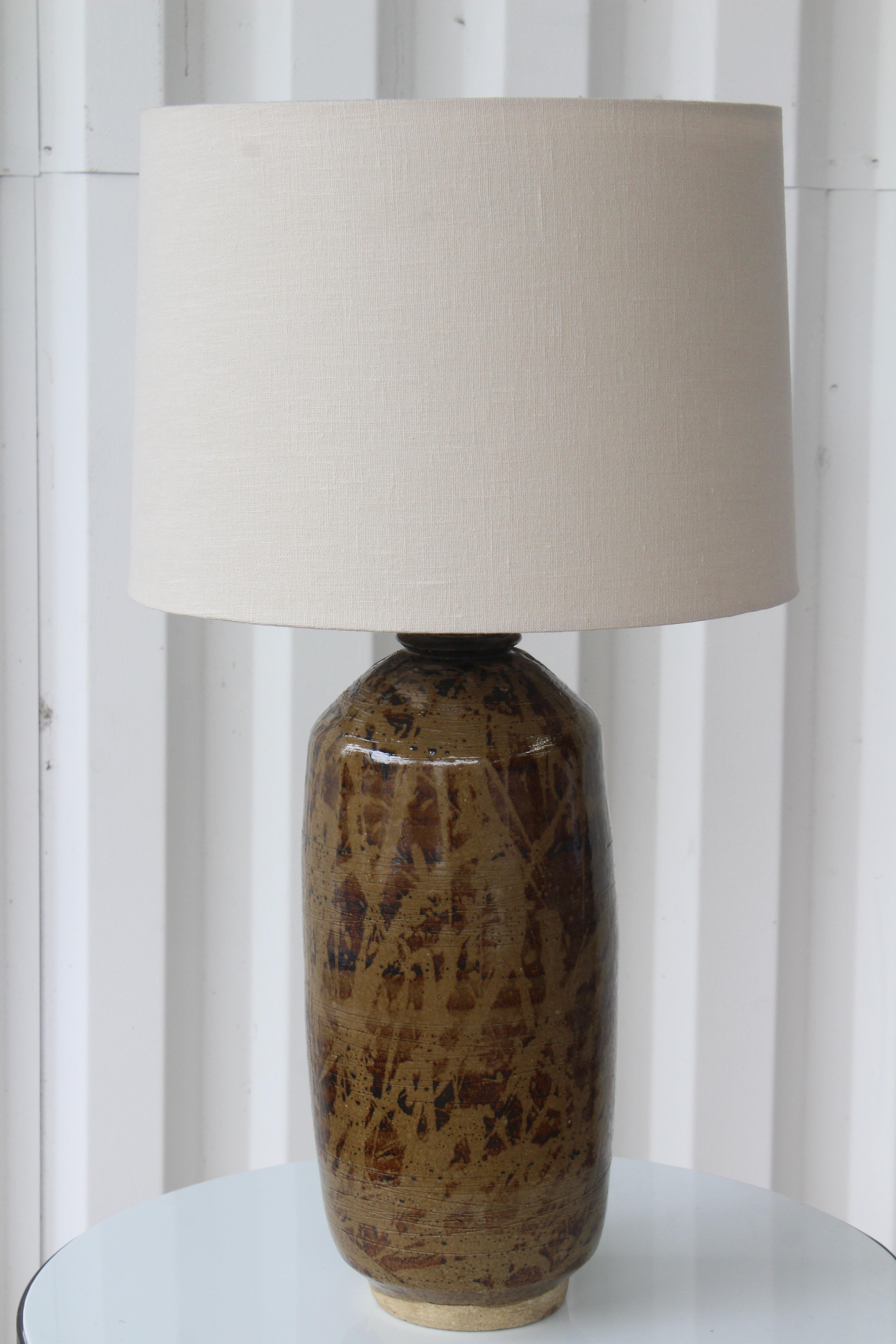 Vintage 1960s studio ceramic pottery lamp. Newly rewired and fitted with a new custom made shade in Belgian linen. 26