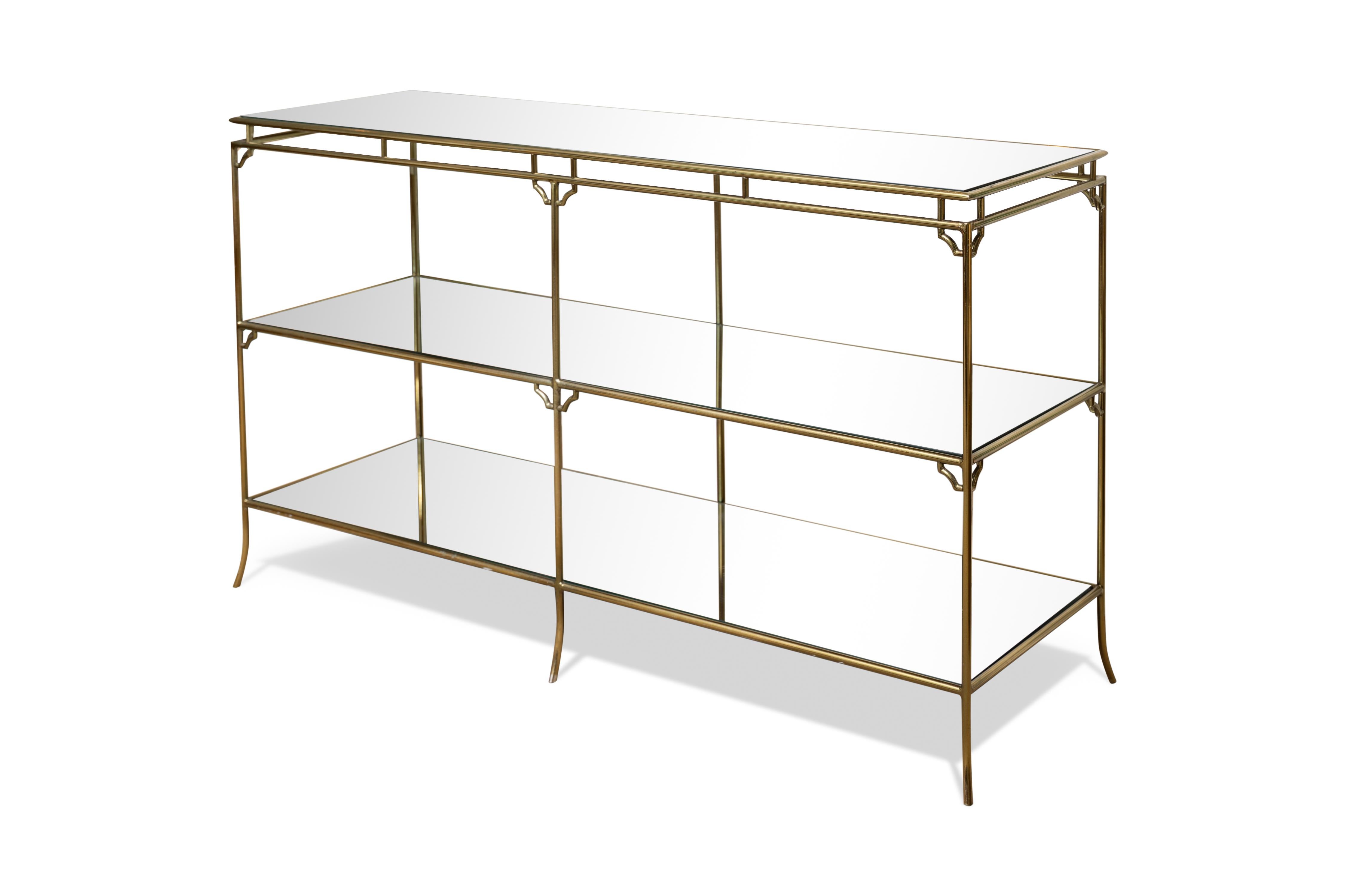 This beautiful super chic vintage three tier brass bamboo console with mirrored shelves is the perfect addition to any room in your home! The mirrored shelves add an elegant and elevated look to this beautiful midcentury brass bamboo console.