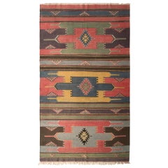 Blauer Kelim-Teppich aus der Mitte des Jahrhunderts mit geometrischem Muster von Teppich & Kelim