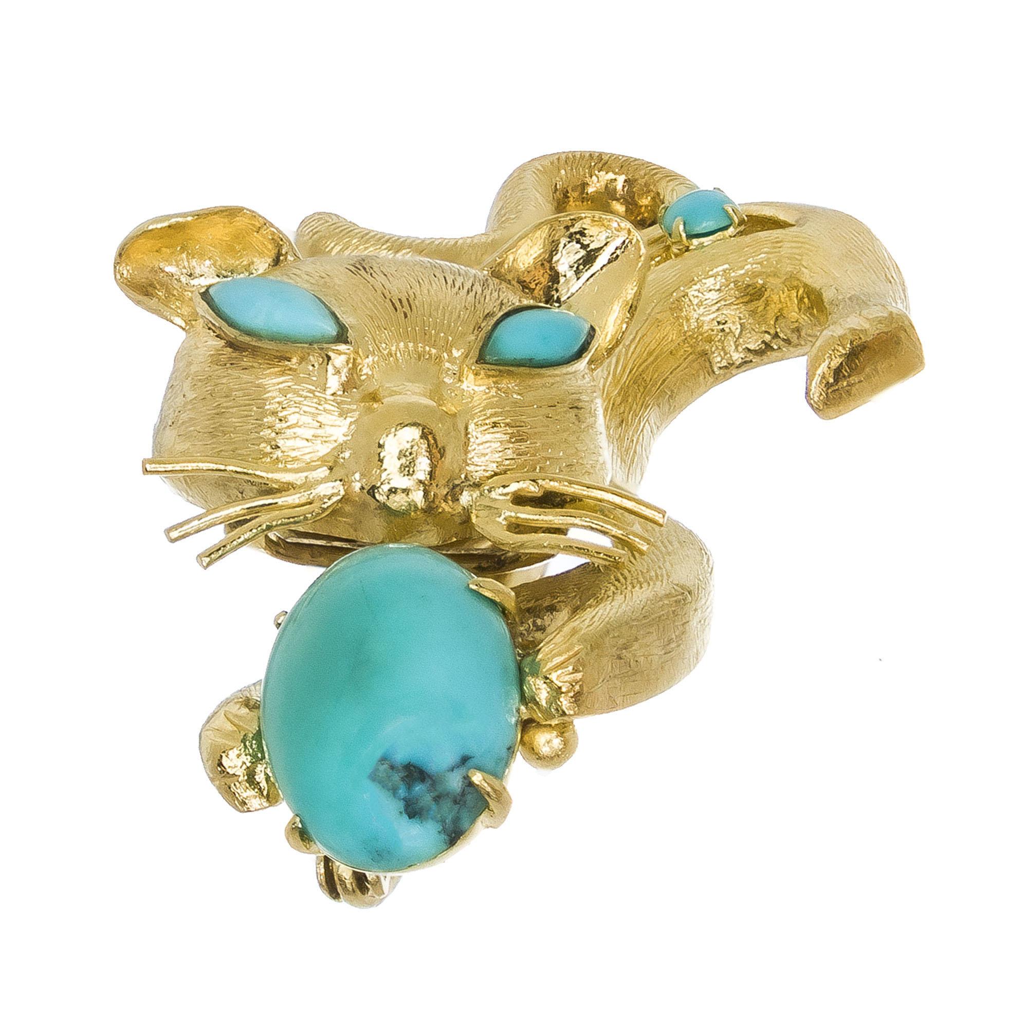 1960’s 18k yellow gold cat brooch with natural round, oval and marquise cut Persian turquoise 18k yellow textured gold.

1 oval blue turquoise, 9 x7mm
2 marquise blue turquoise, 4 x 2mm
6 round blue turquoise, 2.4mm
18k yellow gold
Stamped: 18k
7.6