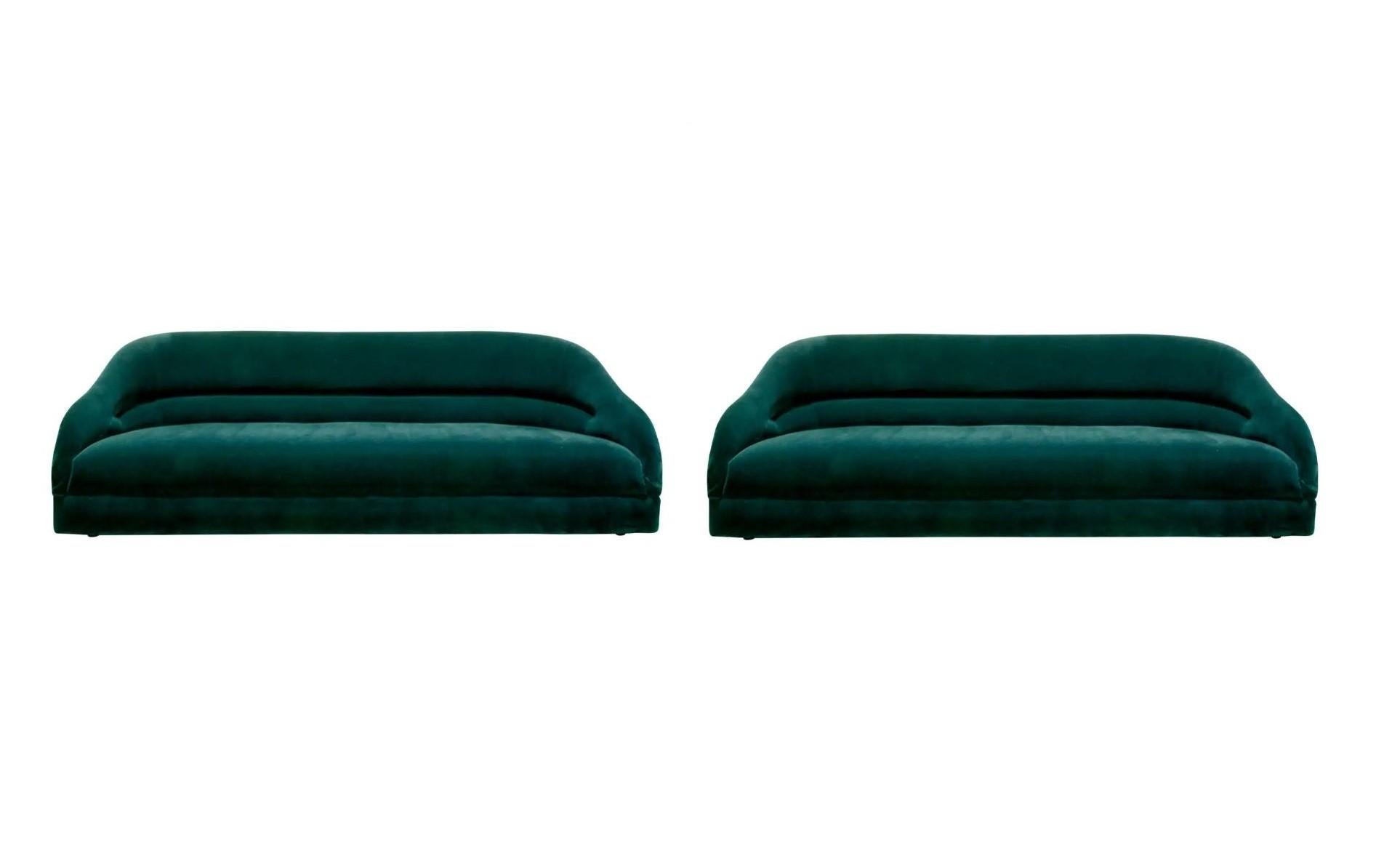 These sofas are absolutely stunning! Classic sofas, model no. 2092, designed by Ward Bennett for Brickel Associates, American, 1970s. A timeless design with deco and modern sensibility. Defined by its curvaceous profile each sofa offers a generous