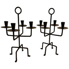 Coppia di candelabri in ferro battuto d'epoca del Medioevo