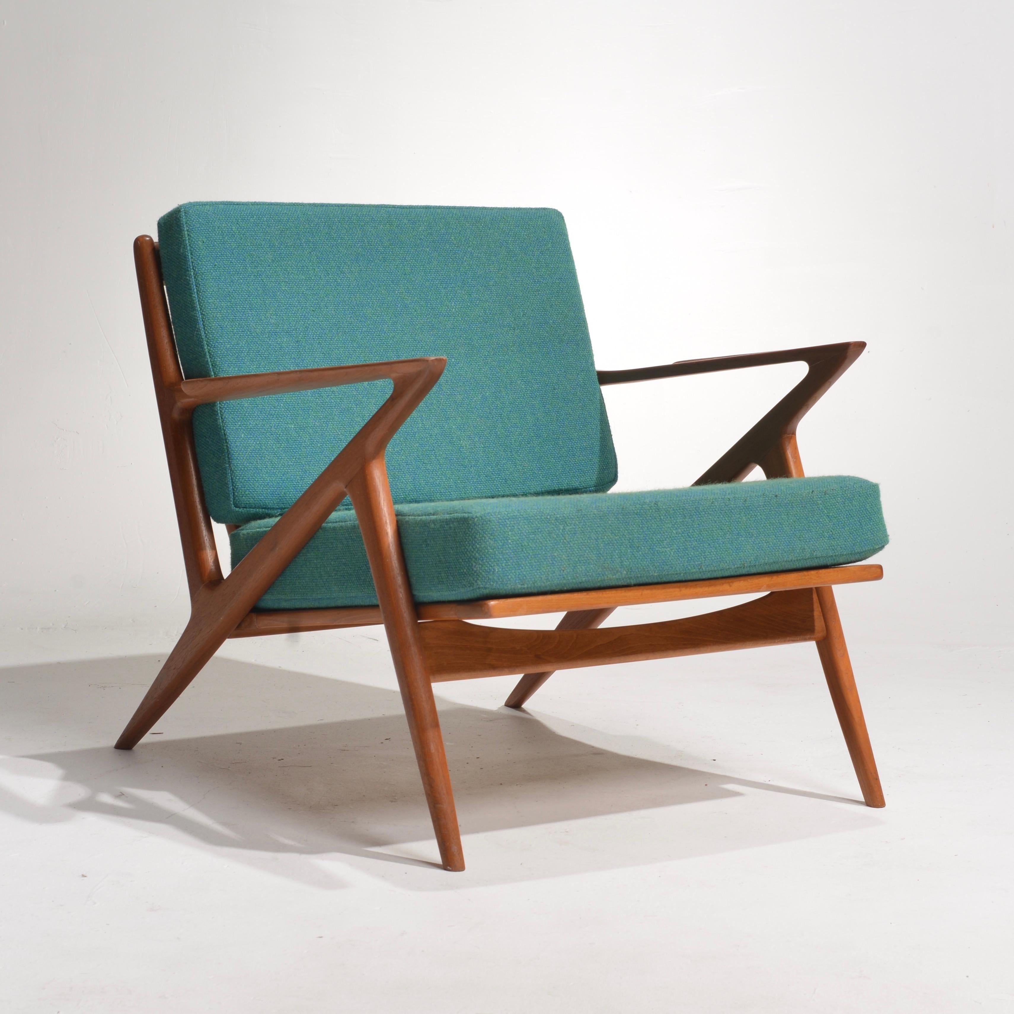 The Teak Z Chair designed by Poul Jensen for Selig features a classic mid-century inspired design, perfect for any style of modern home. This chair is crafted from solid teak wood, giving it a rich and natural warmth and beauty. The signature Z
