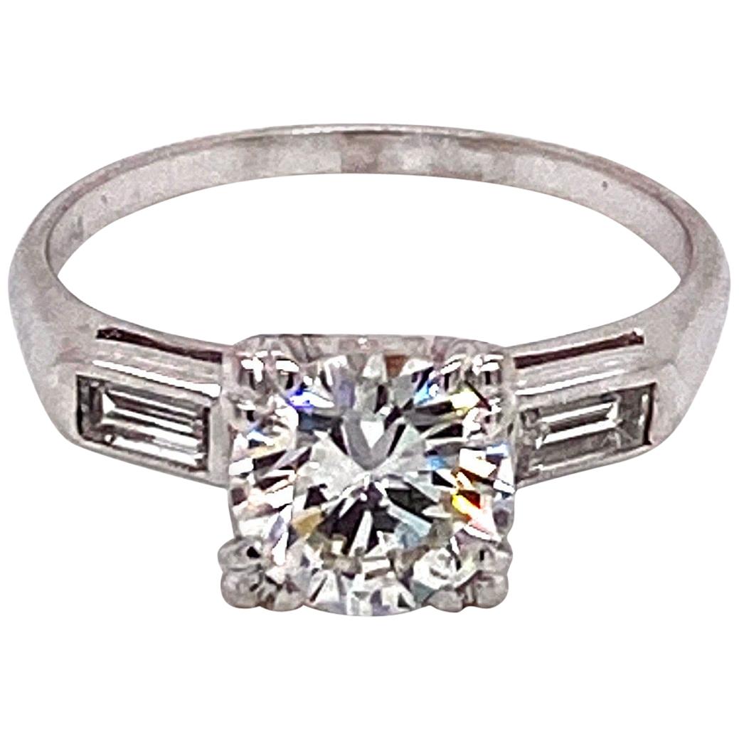 Vintage Midcentury 1950s 1.15 Carat Round Diamond and Baguette Platinum Ring For Sale