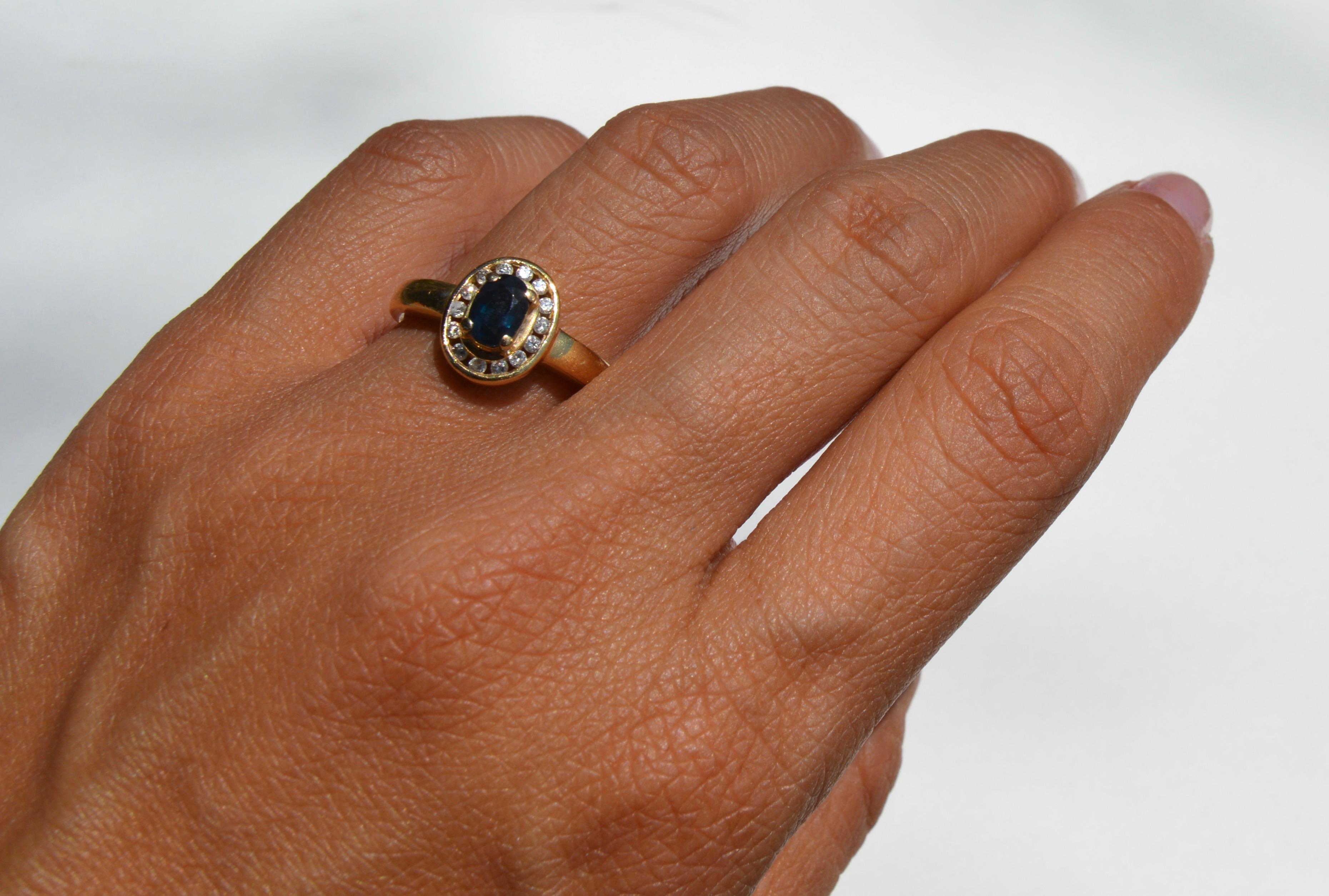 Vintage Midcentury .35 Carat Sapphire Diamond Halo 14 Karat Gold Engagement Ring In Good Condition For Sale In Crownsville, MD