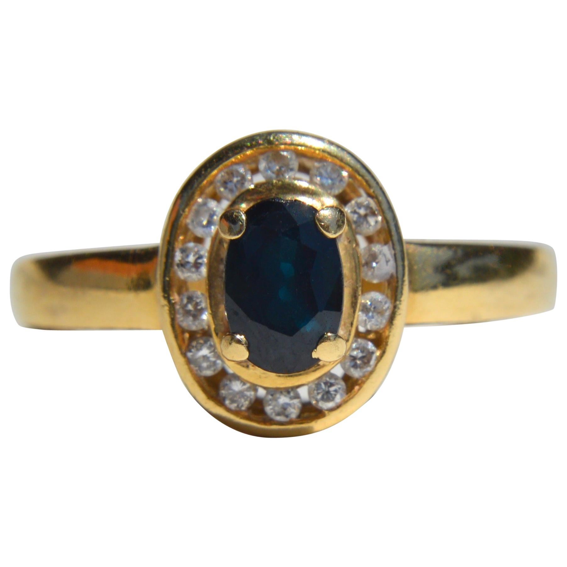 Vintage Midcentury .35 Carat Sapphire Diamond Halo 14 Karat Gold Engagement Ring For Sale