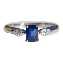 Vintage Midcentury .66 Carat Emerald Cut Sapphire Diamond Platinum Ring