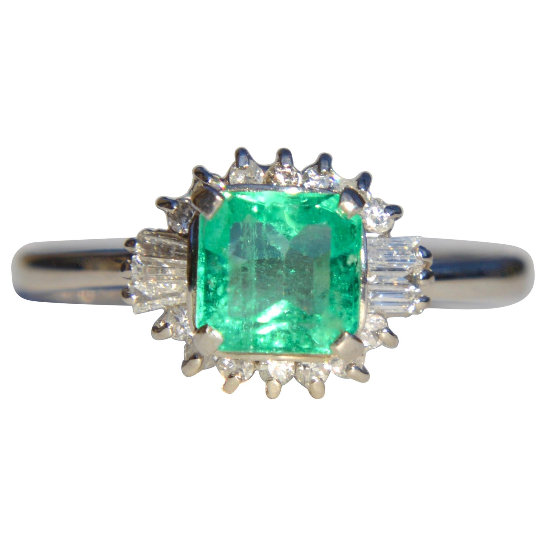 Vintage Midcentury .71 Carat Colombian Emerald Diamond Platinum Ring