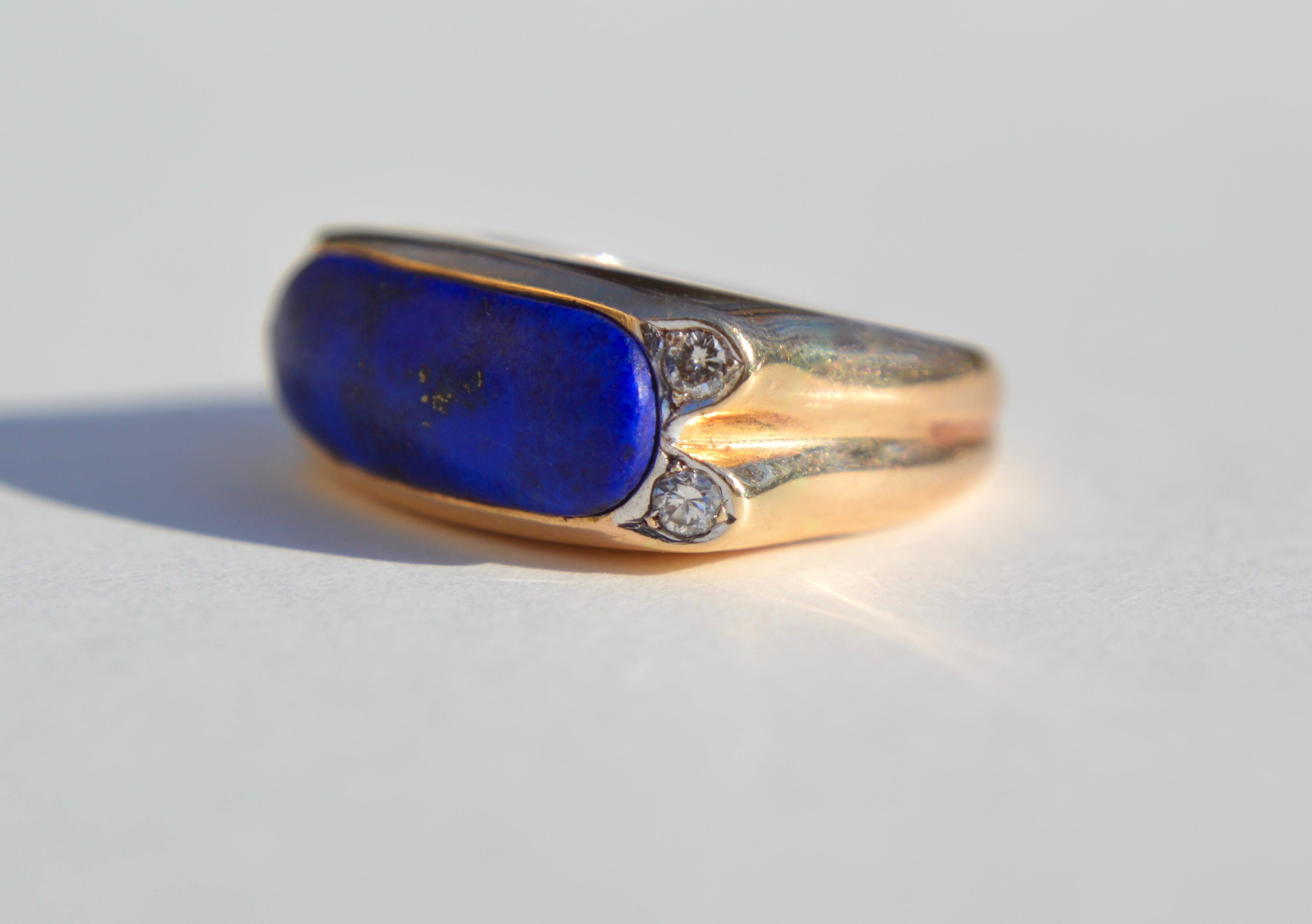 Gorgeous vintage circa 1960s lapis lazuli 14K yellow gold ring with diamonds. Size 5.75 can be resized by a jeweler, in good condition, slight wear to the lapis. 4 single cut diamonds each 2mm in diameter (.03 carat each). Lapis east west cabochon