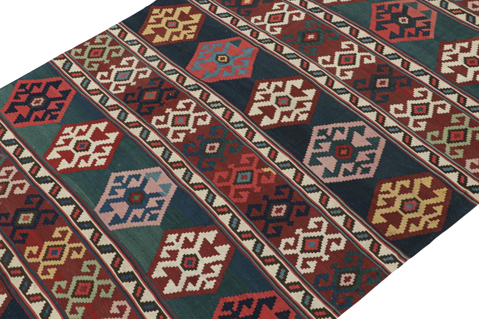This vintage 7x15 Persian kilim is a particularly rare gallery runner believed to hail from Azerbaijan—handwoven in wool circa 1950-1960.

On the Design:

This piece enjoys sharp tribal geometric patterns in rare, crisp colors that have aged more
