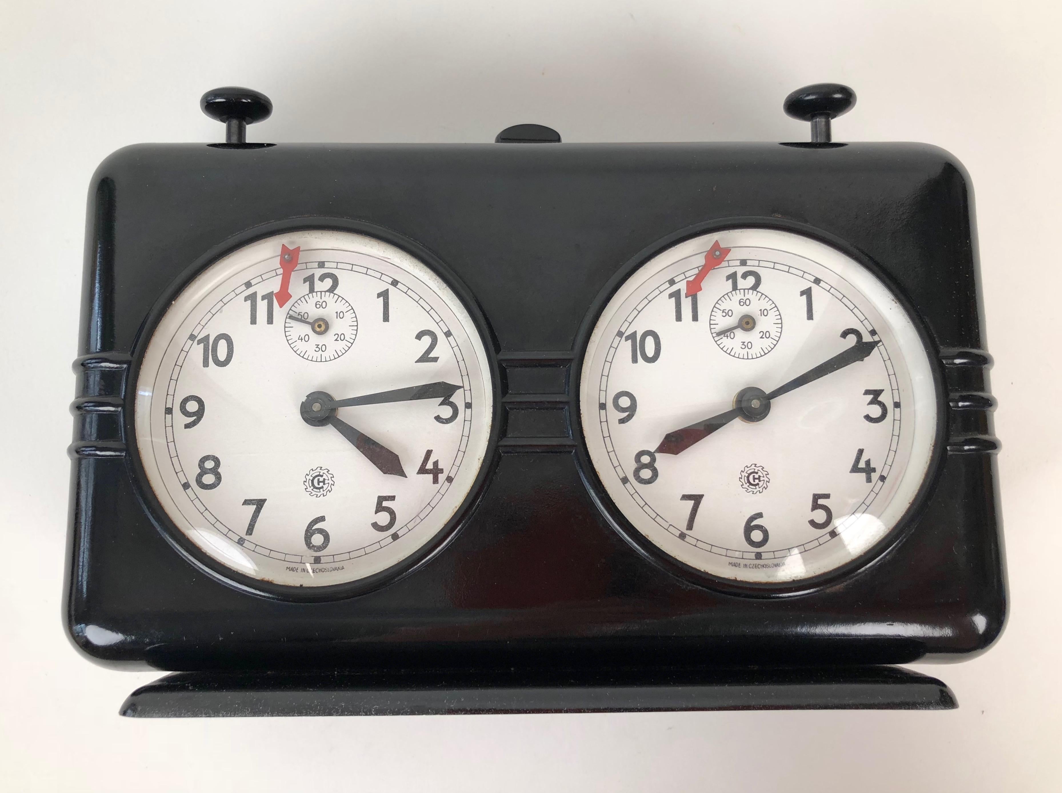 This Chess Clock Timer was produced in the 1950's by Cronotechna 
in Šternberk, Czechoslovakia. The housing is made Bakelite and is in very good condition. The clock has been tested and function as it should. 
If you are a chess lover this is a
