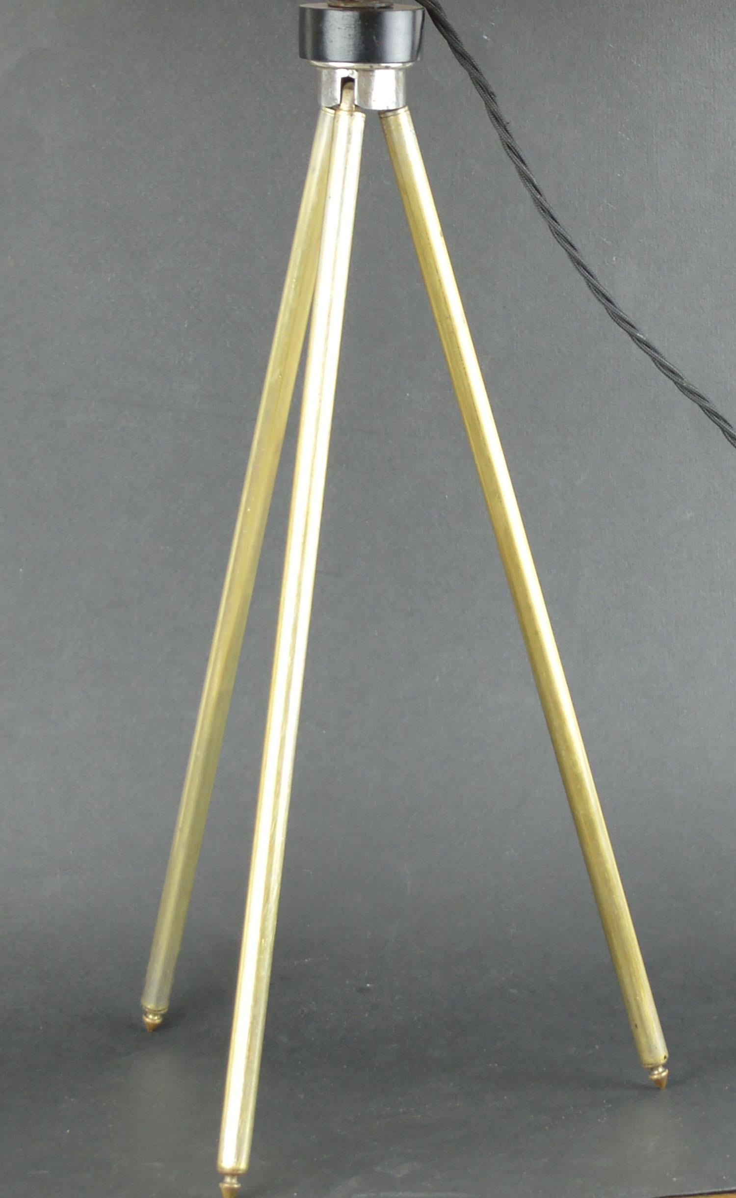 Super brushed brass tripod table lamp. Yellow velvet shade

Telescopic so the height can be adjusted. The measurement given below relates to the position in the image.

Converted from a camera tripod.

Re-wired to UK standards.

Not
