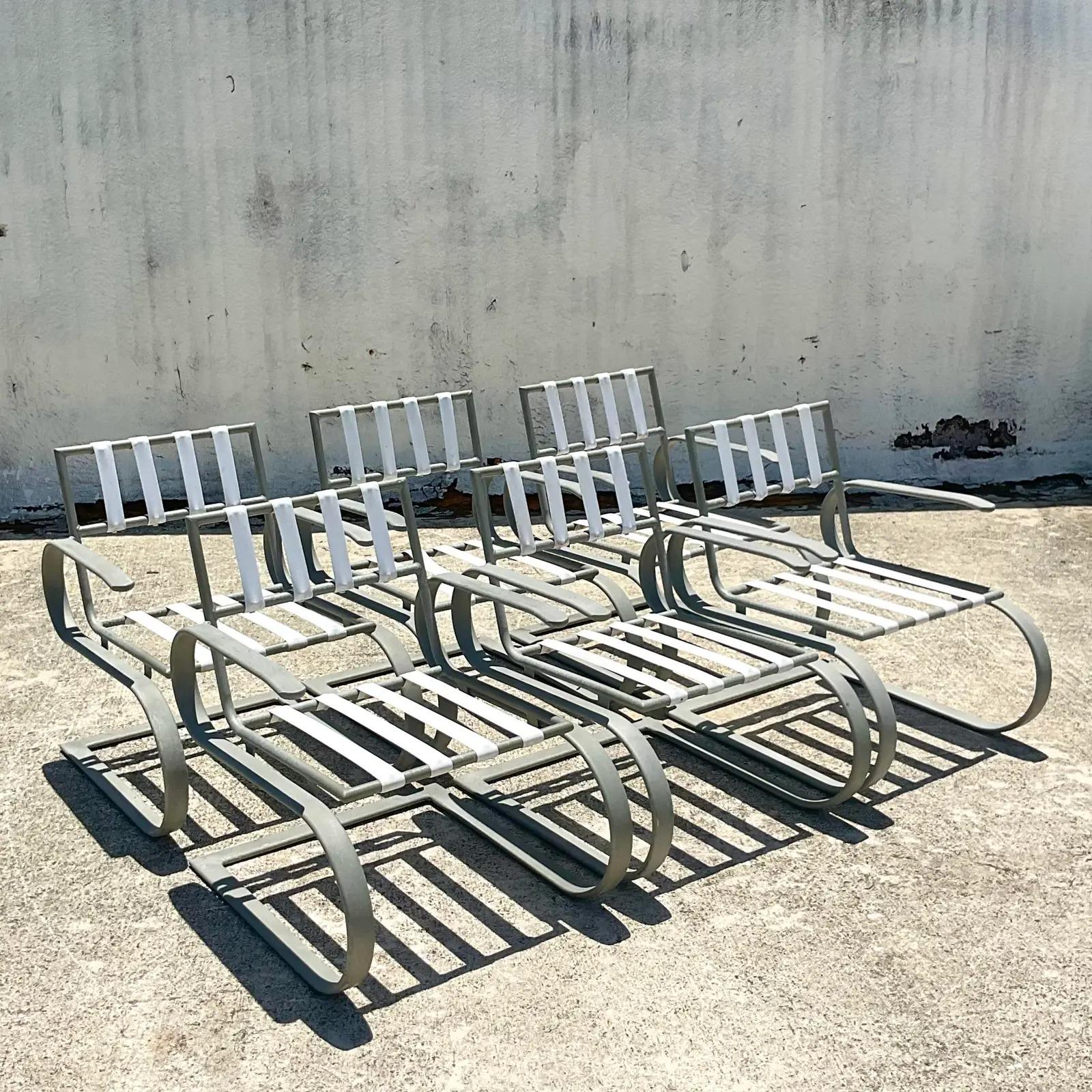 Fantastic set of 6 vintage 1960s Midcentury outdoor dining chairs. Designed by the legendary Burt Baker for Tropitone. Revolutionary powder coated aluminum in the original sparkle finish. Sexy Springer shape for maximum comfort and sleek design.
