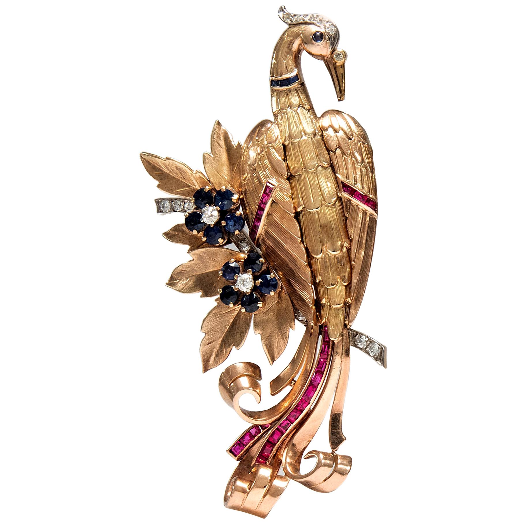 This bird of paradise brooch is not only a quintessential midcentury jewel, but likewise a first-class conversation piece. Dating to circa 1950, it perfectly embodies the taste of the post-war era: warm gold tones such as red and yellow, combined