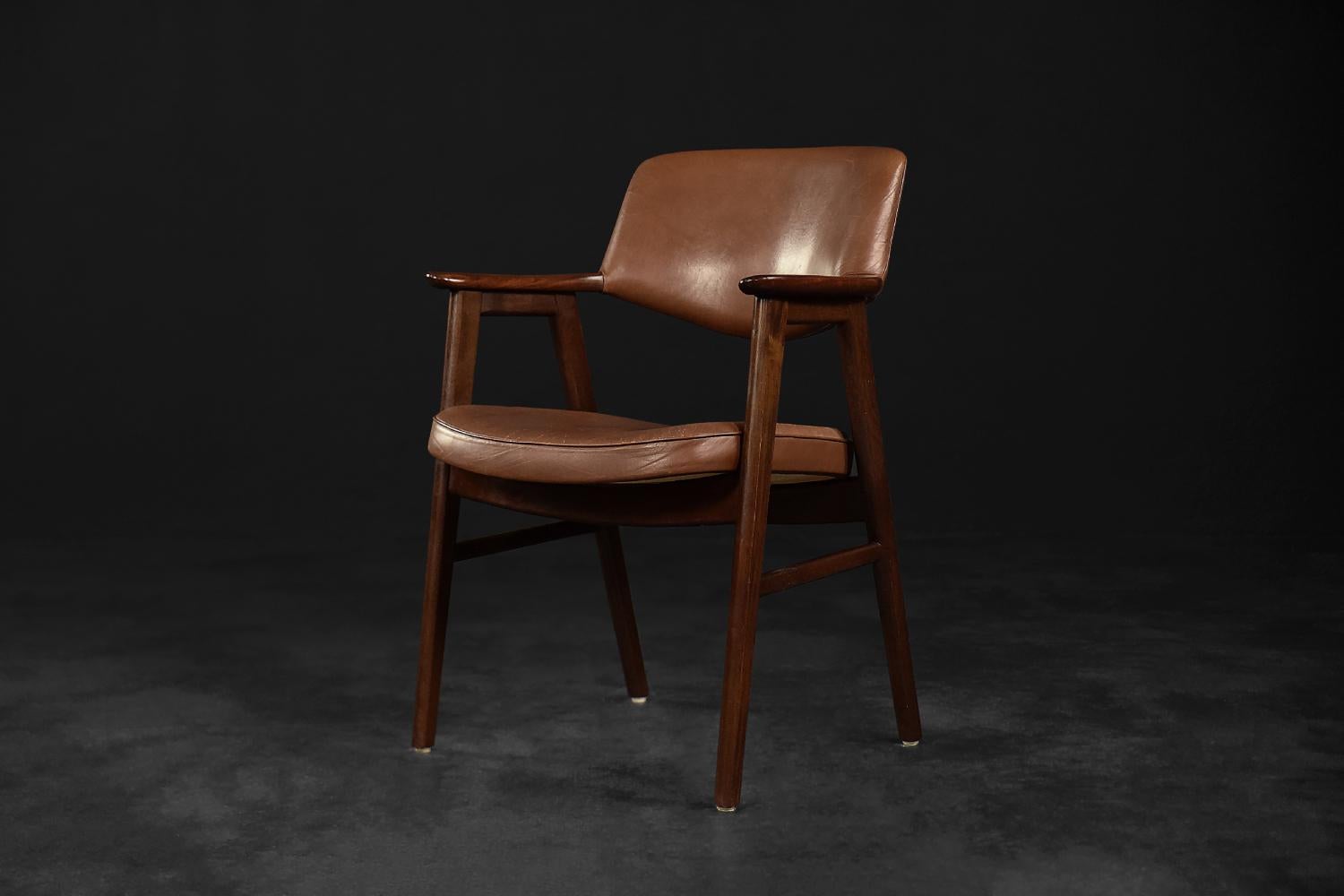 This elegant executive chair was designed by Erik Kirkegaard for the Danish manufactory Høng Stolefabrik during the 1960s. It is model number 43. The frame is made of precious rosewood. The A-shaped legs are Kirkegaard's business card and hallmark.