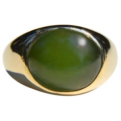 Vintage Midcentury Era 5.05 Carat Nephrite Jade 14 Karat Gold Oval Signet Ring
