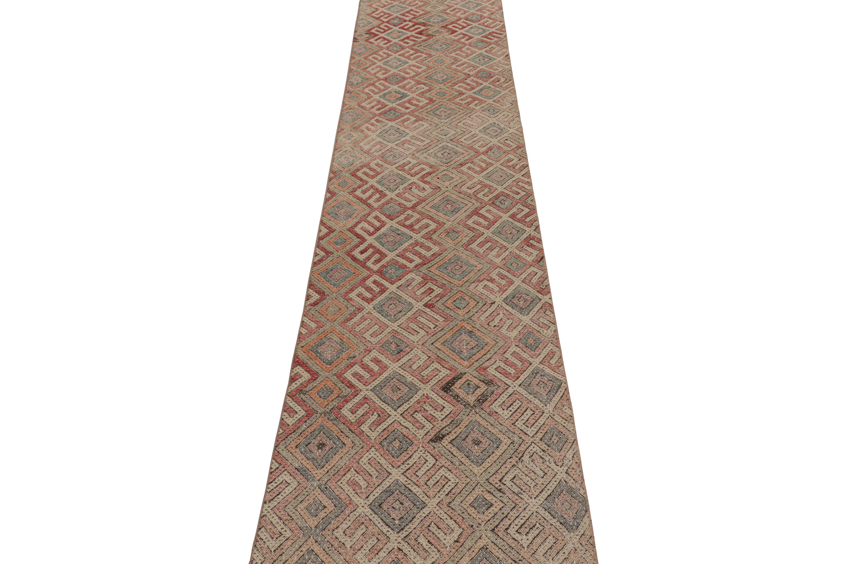 Vintage Midcentury Geometric Red Green, White Wool Kilim Runner by Rug & Kilim In Good Condition For Sale In Long Island City, NY