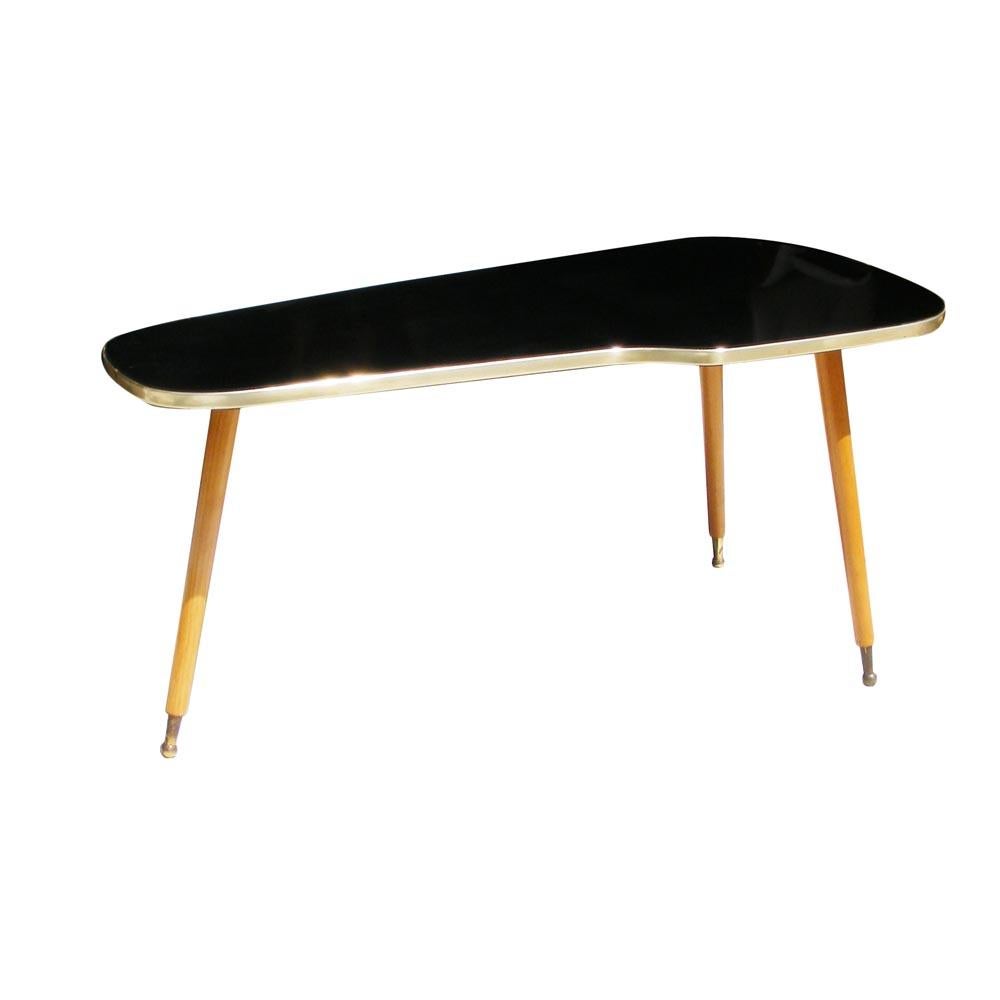 Vintage Midcentury Atomic Kidney Shape Coffee Cide Table From Germany 


Unique kidney shaped table with gold edge, spayed legs with gold capping. 
Table is topped with black glass.