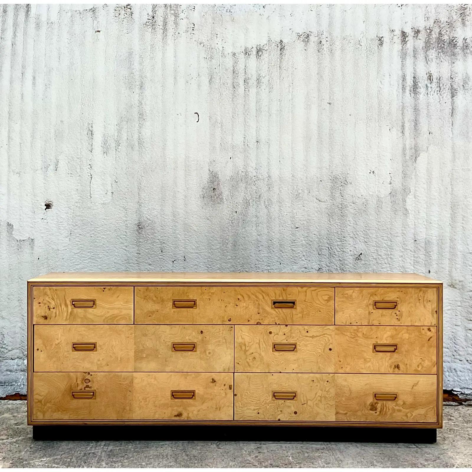 Incredible vintage MCM 9 drawer dresser. Made by the iconic Henredon group and marked on the back. Beautiful Burl wood drawers fronts. Acquired from a Palm Beach estate.