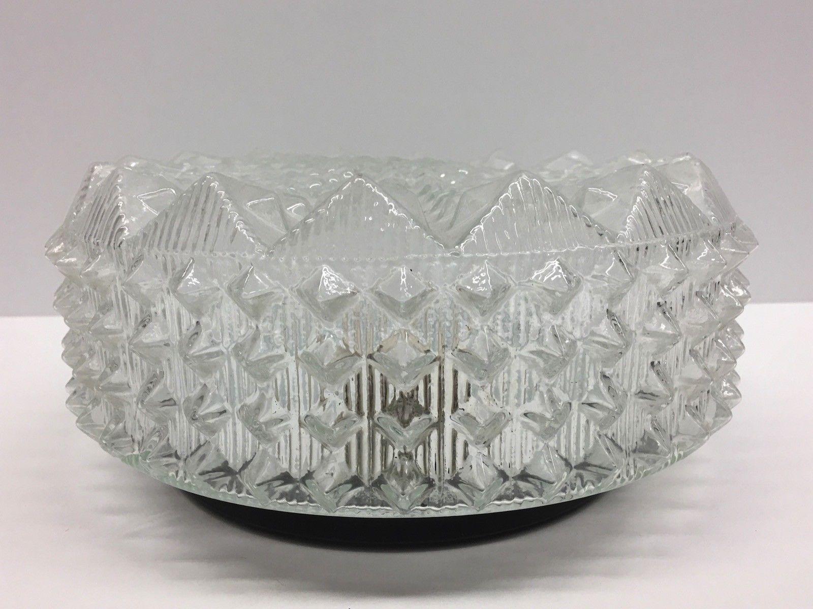 Beautiful ice crystal textured flush mount. Made in Germany. Gorgeous textured glass flush mount with metal fixture. The fixture requires one European E27 Edison bulb up to 75 watts.