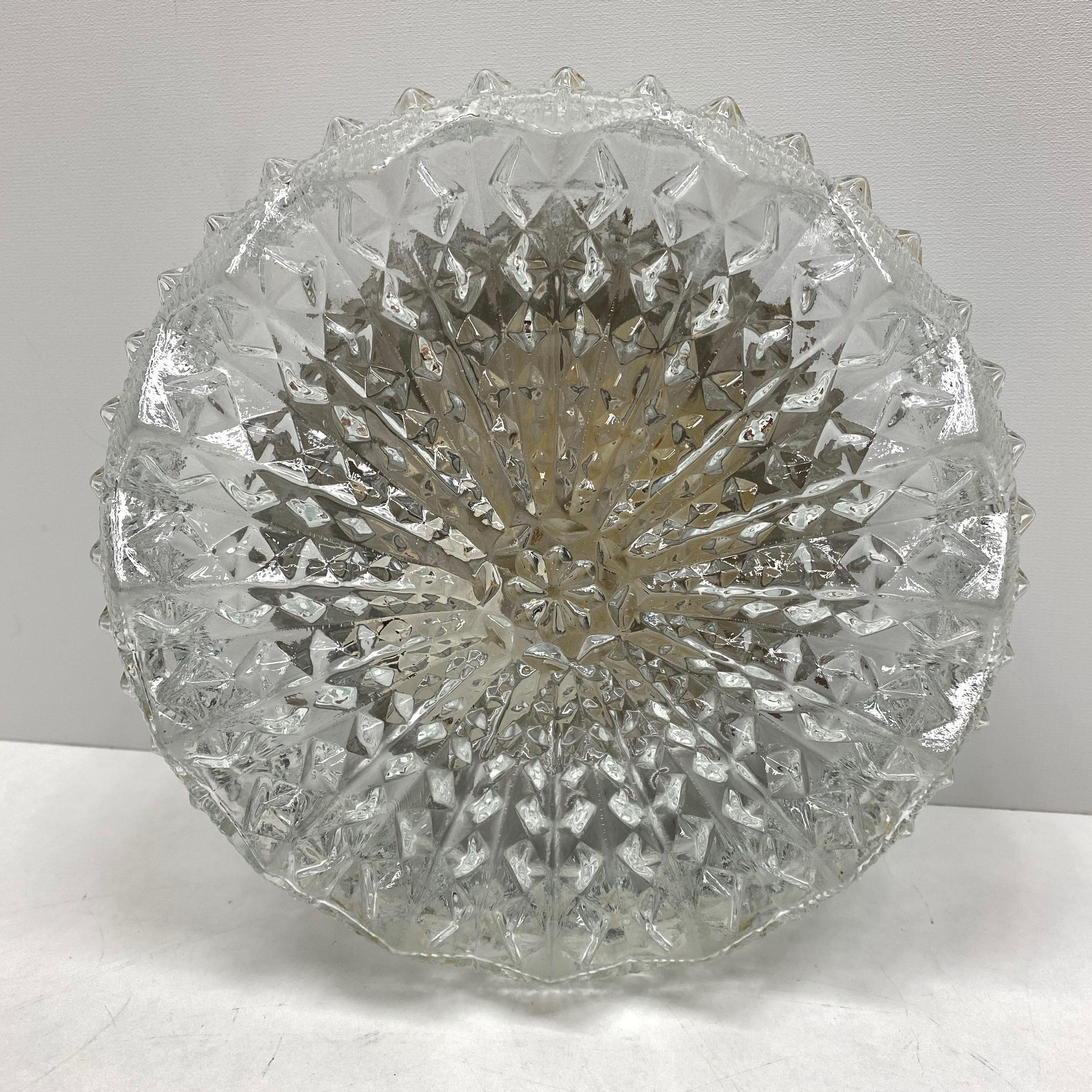 Beautiful ice crystal textured flush mount. Made in Germany. Gorgeous textured glass flush mount with metal fixture. The fixture requires one European E27 Edison bulb up to 75 watts.