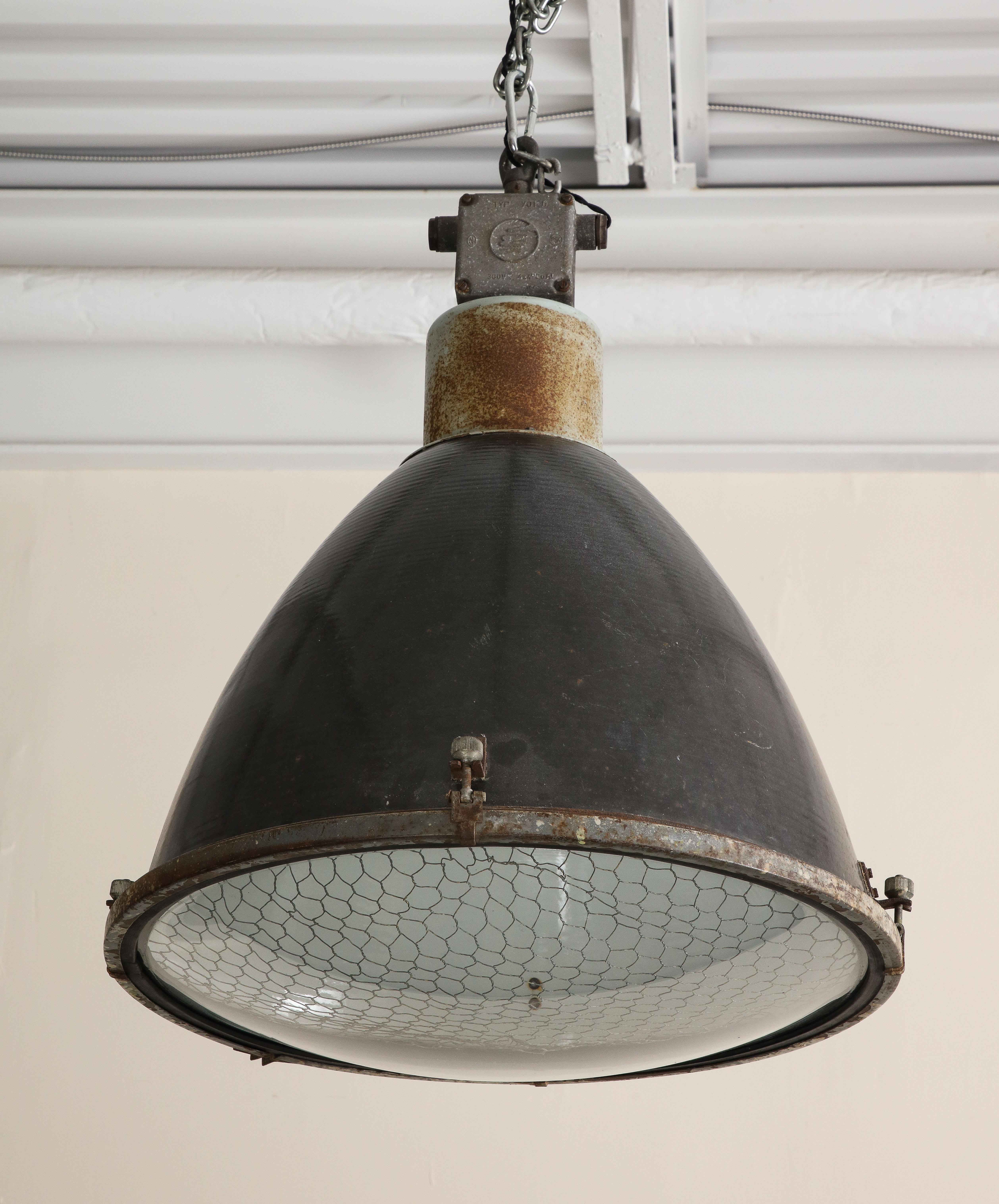 Vintage Mid-Century Industrial Cast Iron Pendant Light with Chicken Wire In Good Condition In Chicago, IL