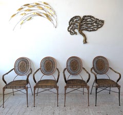 Vintage midcentury iron, cane and rattan armchairs dining chairs: 4 available