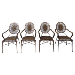 Vintage midcentury iron, cane and rattan armchairs dining chairs: 4 available