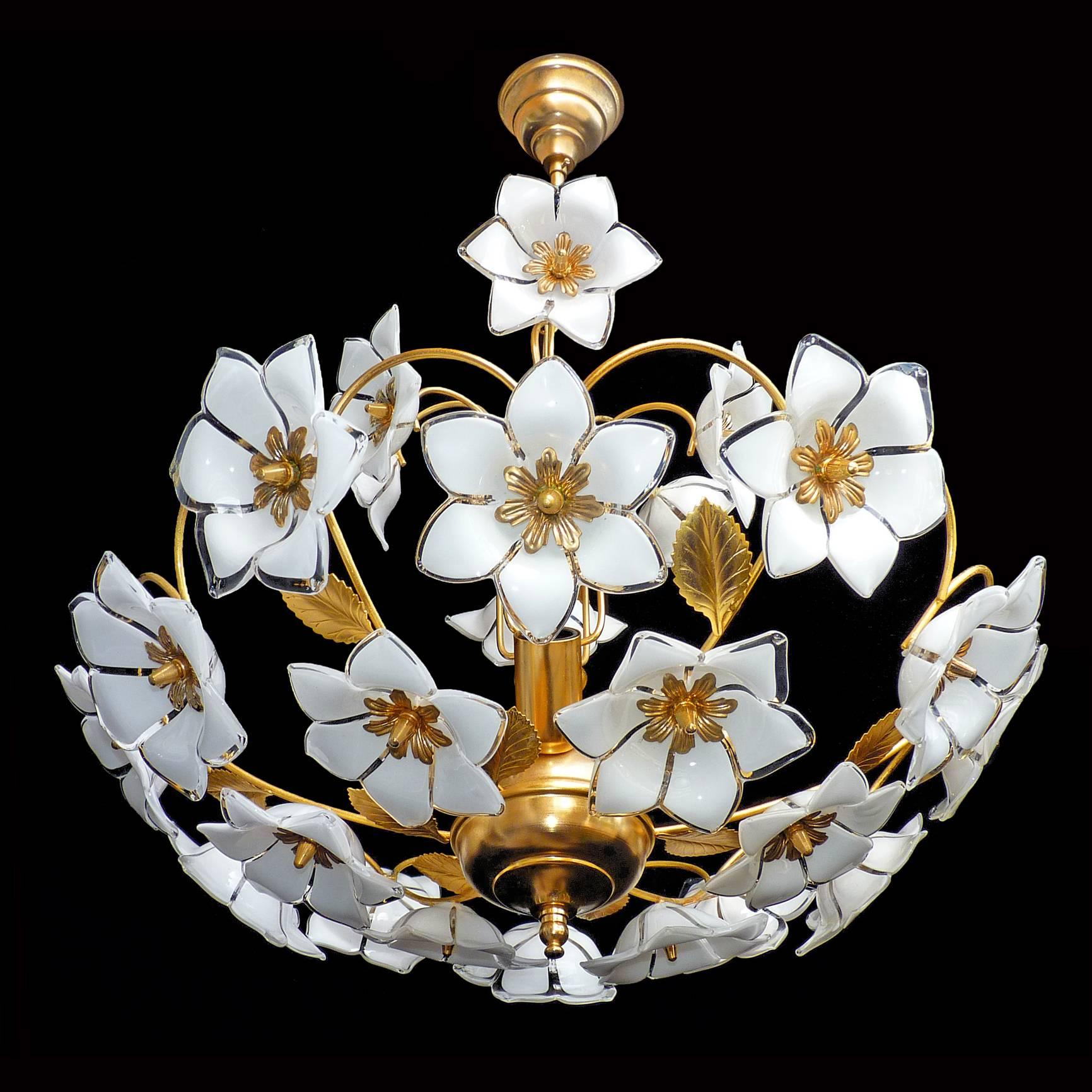 1960s vintage Italian Murano flower bouquet after Venini art-glass/ 24 hand-blow white and clear glass flowers and gold-plated brass.
Measures:
Diameter 22 in/ 55 cm
Height 30 in/ 75 cm
Weight: 11 lb/5 Kg
Four light bulbs E14/ 60 W - Good