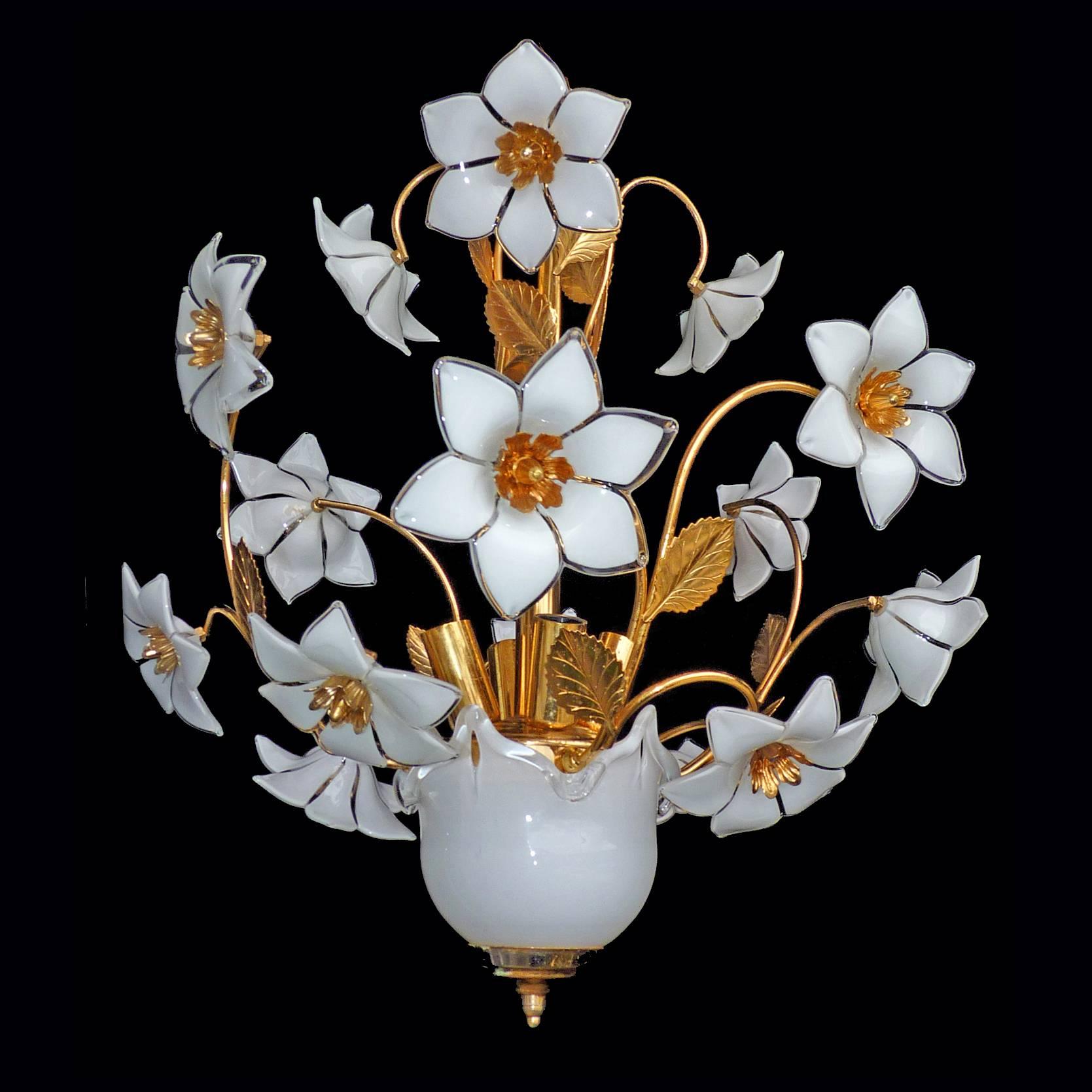 1970s vintage Italian Murano flower bouquet after Venini art-glass/ hand-blow white and clear glass flowers and gold-plated brass.
Measures:
Diameter 18 in/ 45 cm
Height 34 in (24 in + 10 in/ chain) ; 85 cm (60 cm + 25 cm/chain)
Weight: 7 lb/3