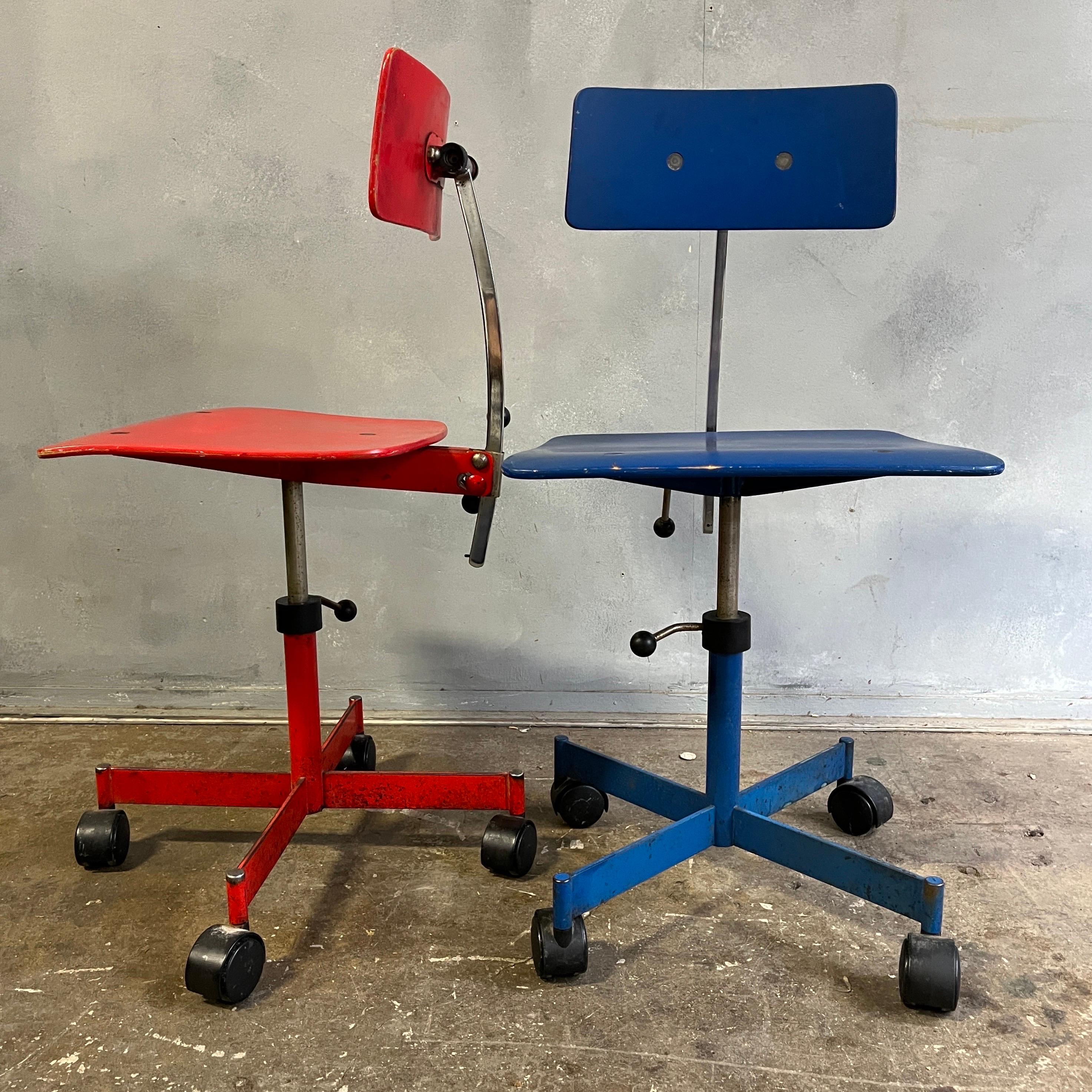 Brilliant red and blue primary color Kevi fully adjustable desk chair, with adjustable seat height, tilting back and adjustable arch back support. Original paint and showing signs of wear and wonderful honest patina. This swivel chair goes down to