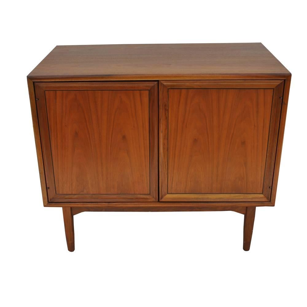 Kipp Stewart for Drexel walnut record cabinet 


Beautiful Kipp Stewart for Drexel Declaration record cabinet, circa 1960s. Walnut with two spring action release cabinet doors. One side has original record slots and also features an overhead