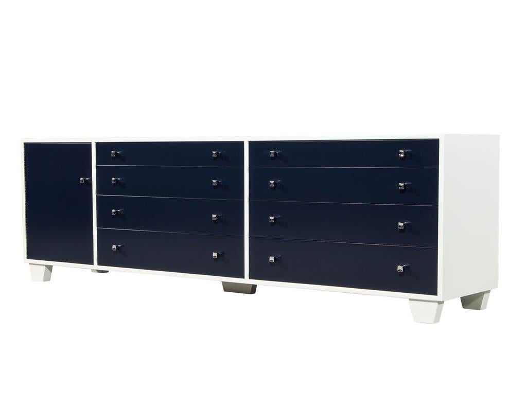 Vintage midcentury lacquered credenza dresser media cabinet. Finished by our Carrocel Craftsmen in a rich two tone midnight blue & cream white lacquer. Solid walnut construction throughout, this cabinet is built in an era of outstanding quality and