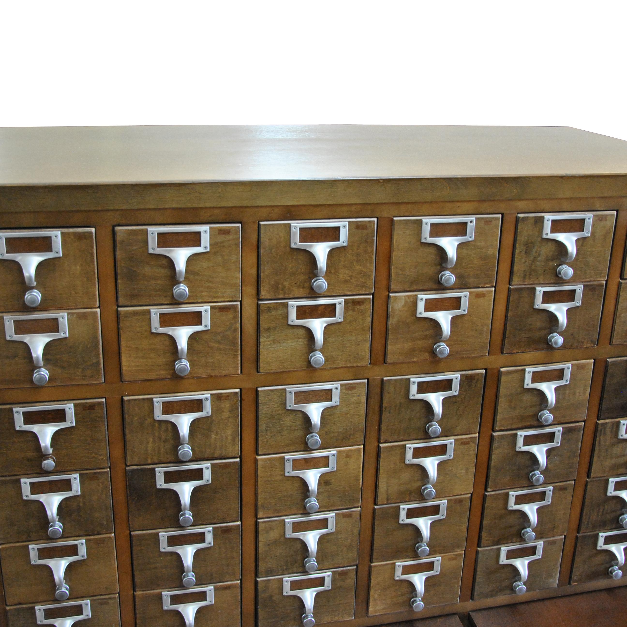 Vintage midcentury library card catalogue cabinet.

Rare walnut version on chrome base. 
72 drawers with metal pulls and trim.