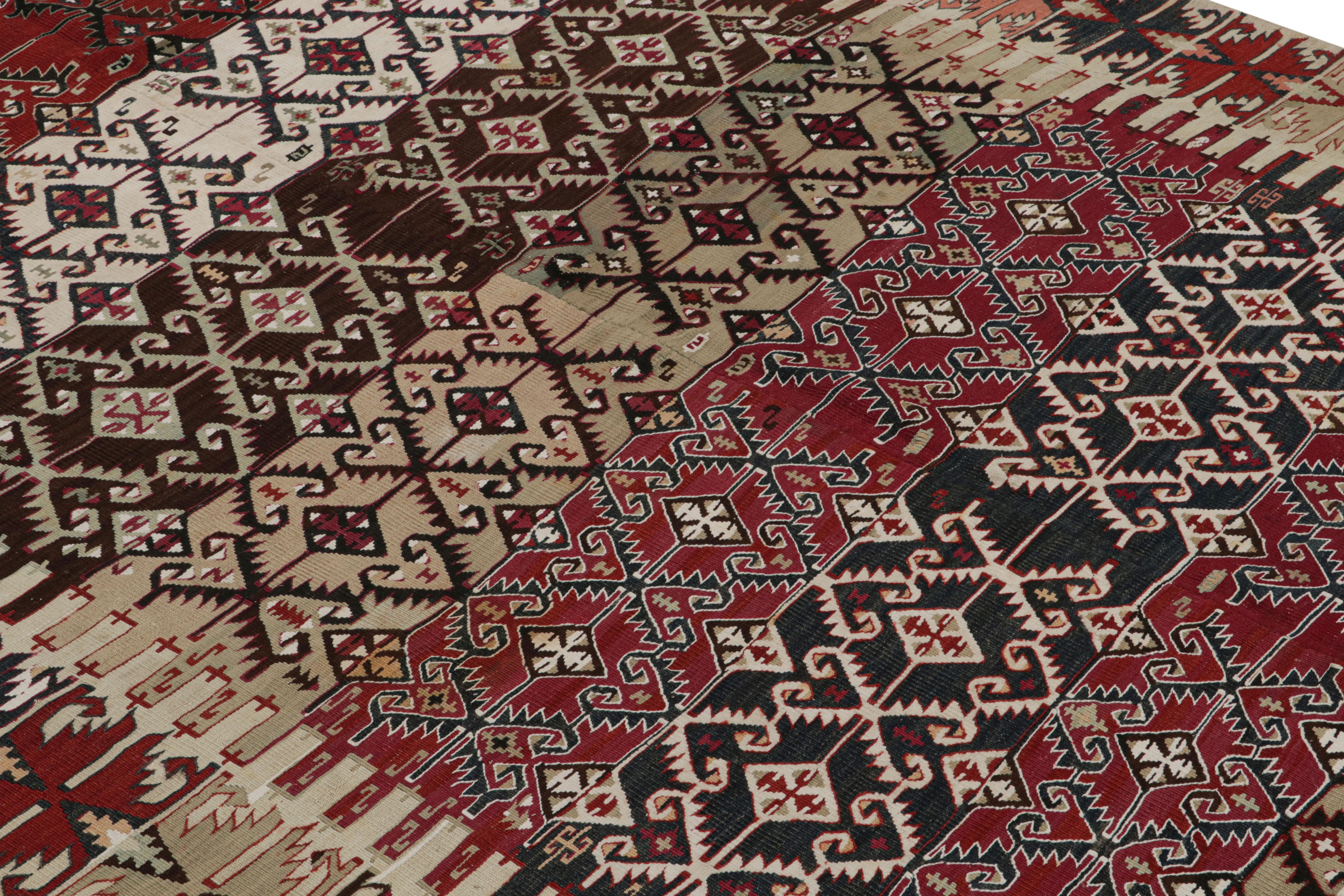 handwoven in Turkey originating between 1950-1960, this vintage midcentury 6x10 wool Kilim hails from the city of Malatya, one of our collection’s uncommon but welcomed rarities from Eastern Anatolia with a distinct pattern and colorway. The sharp,